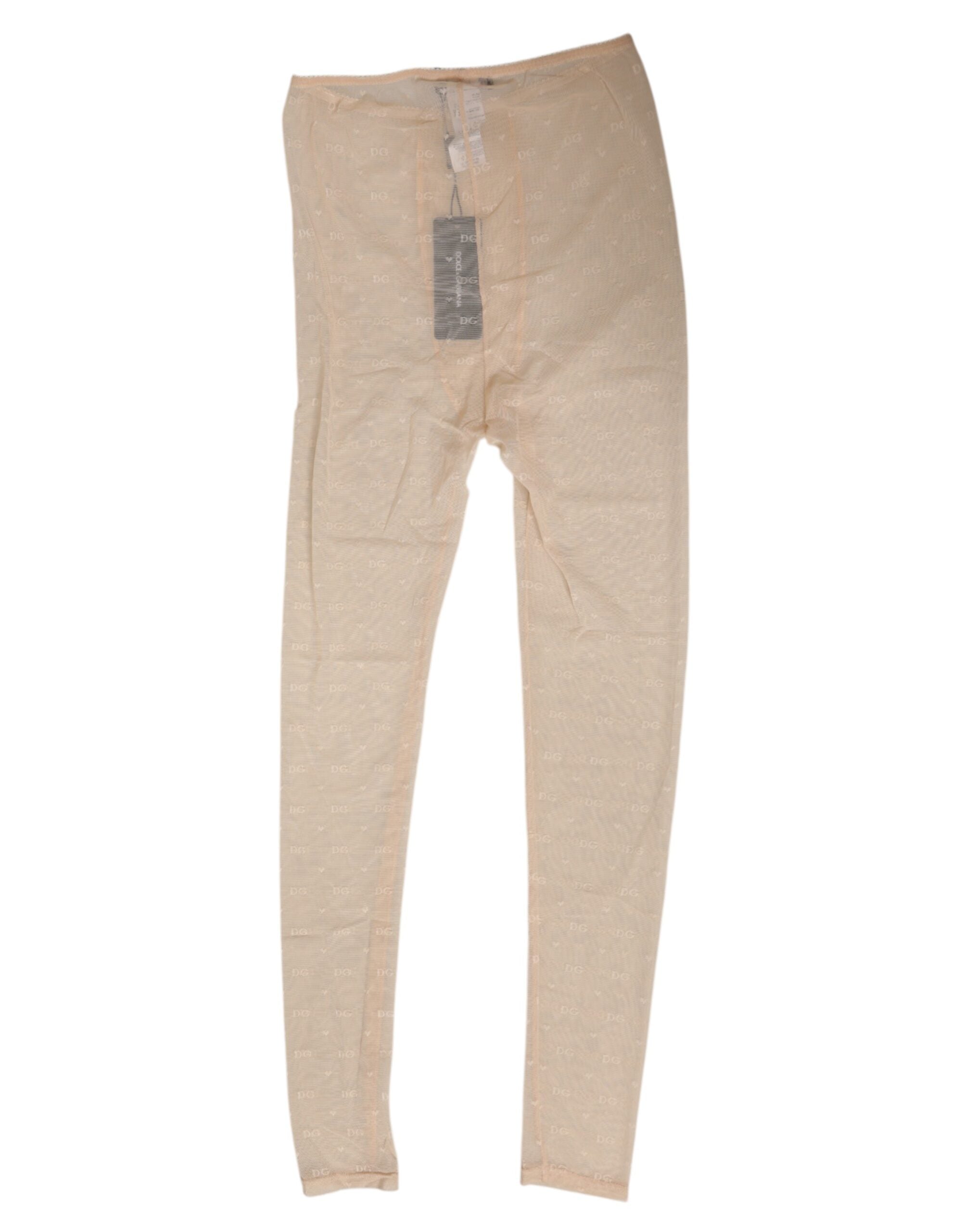 Indulge in the exquisite Dolce & Gabbana Beige Nylon Stretch Logo Lace Leggings, crafted for a sensual silhouette and timeless elegance, embodying luxury and sophistication.