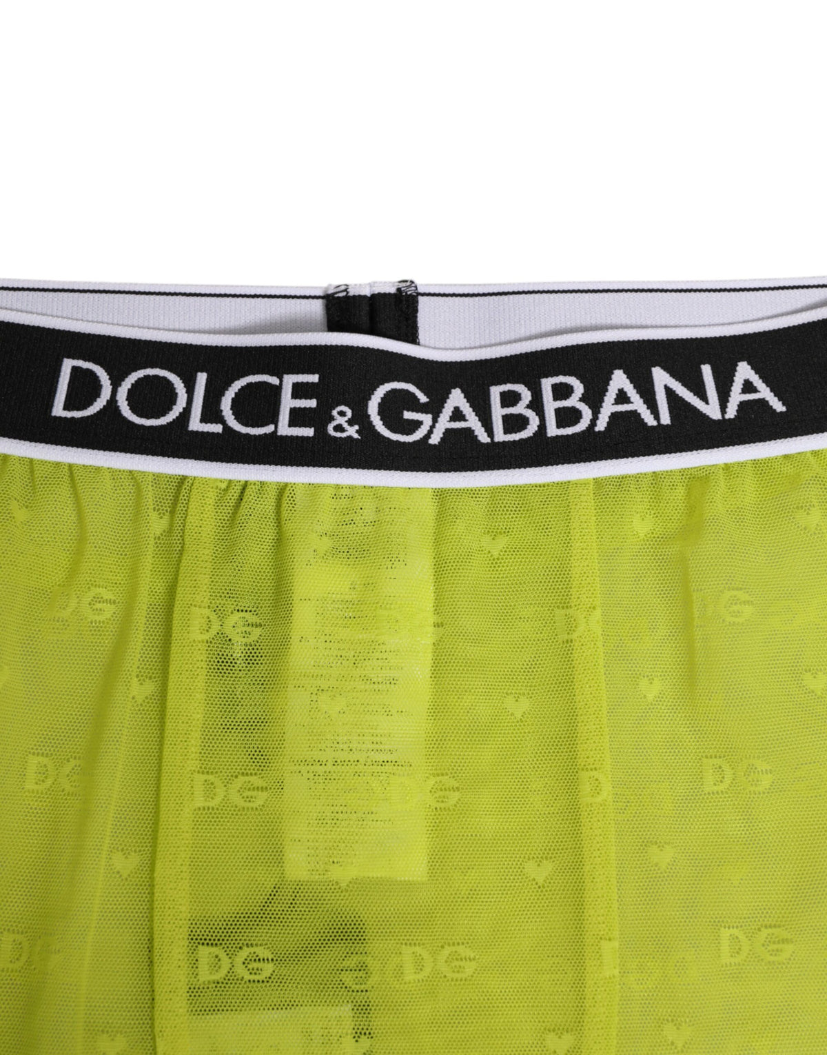 Indulge in the exquisite Dolce & Gabbana Neon Green Nylon Logo Lace Leggings, where luxurious craftsmanship meets sensual allure, perfect for the discerning individual.