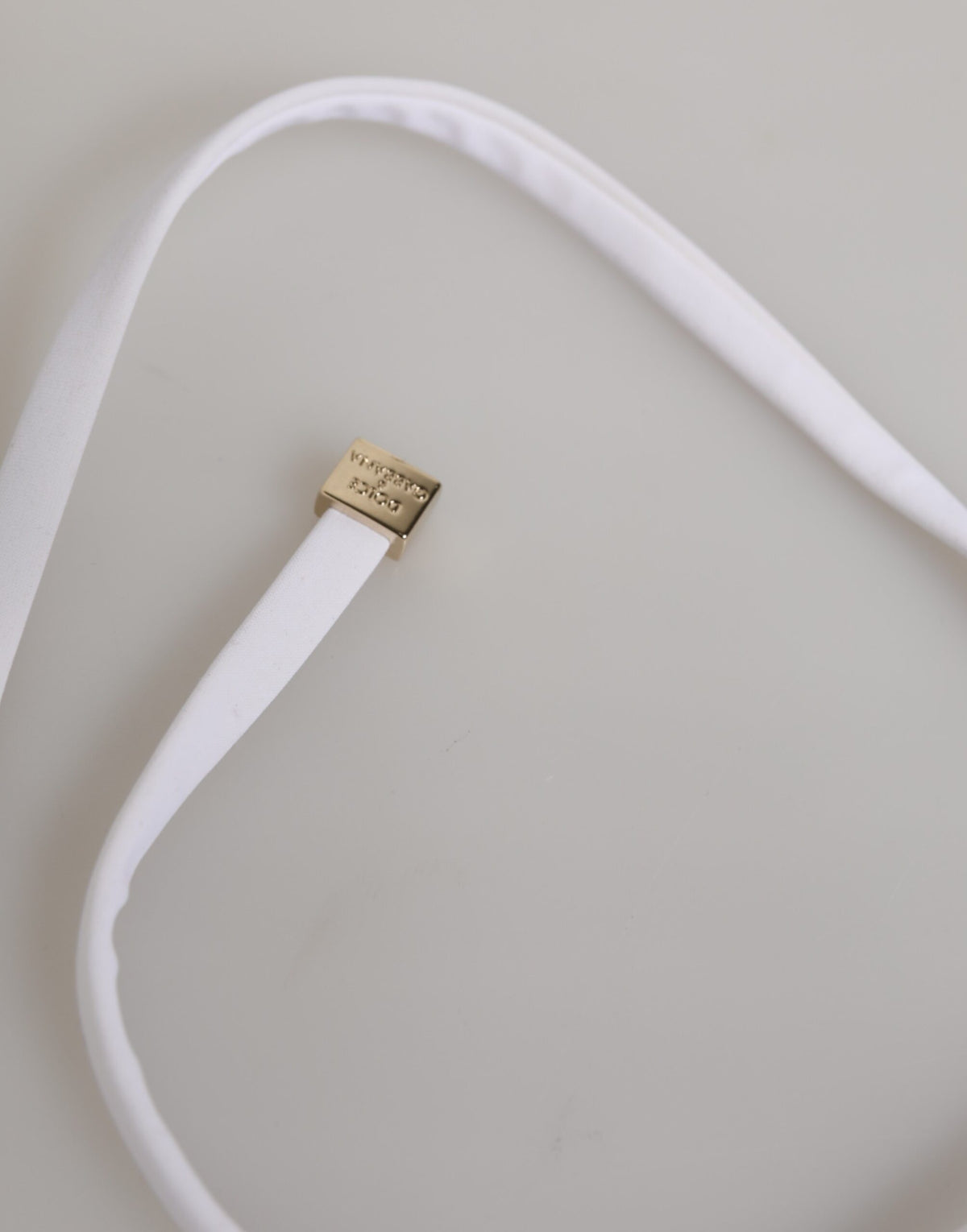 Experience the allure of the Dolce & Gabbana White Logo Swimsuit, a masterpiece of Italian craftsmanship that embodies timeless sophistication and luxurious elegance.