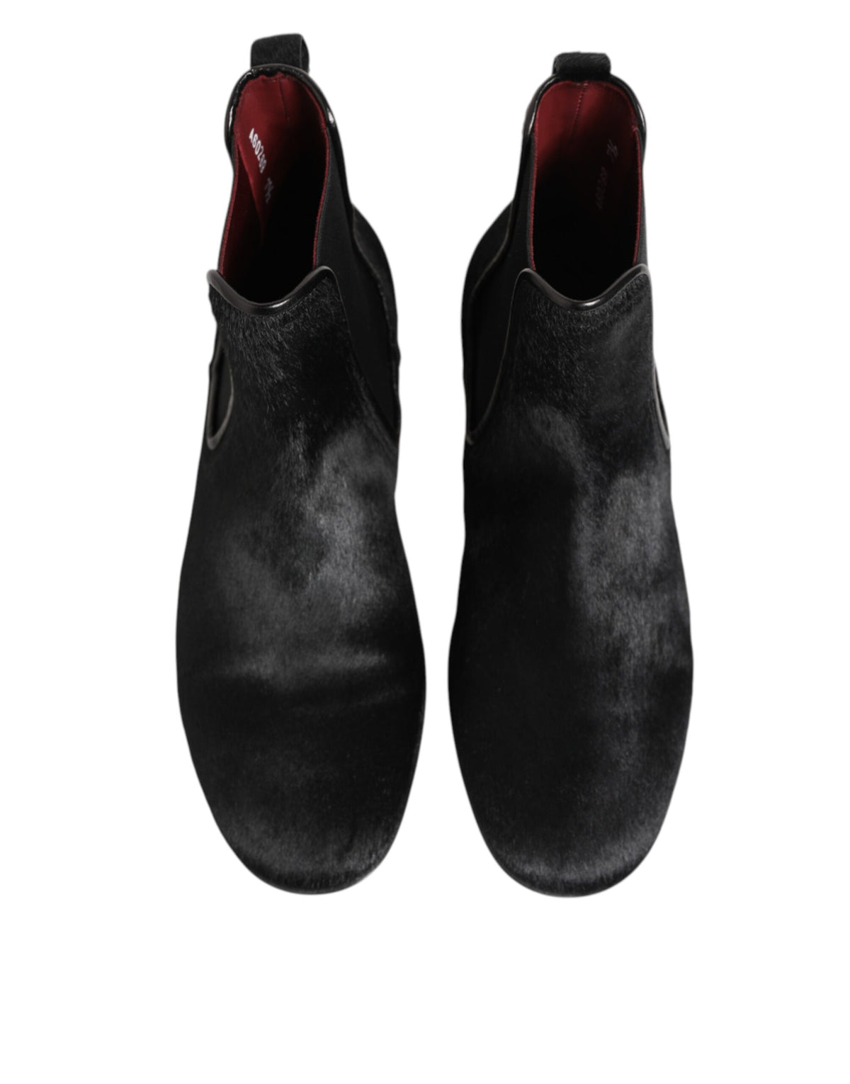 Indulge in the exquisite Dolce & Gabbana Black Leather Fur Chelsea Boots, where artisanal craftsmanship meets timeless elegance, perfect for the discerning connoisseur.
