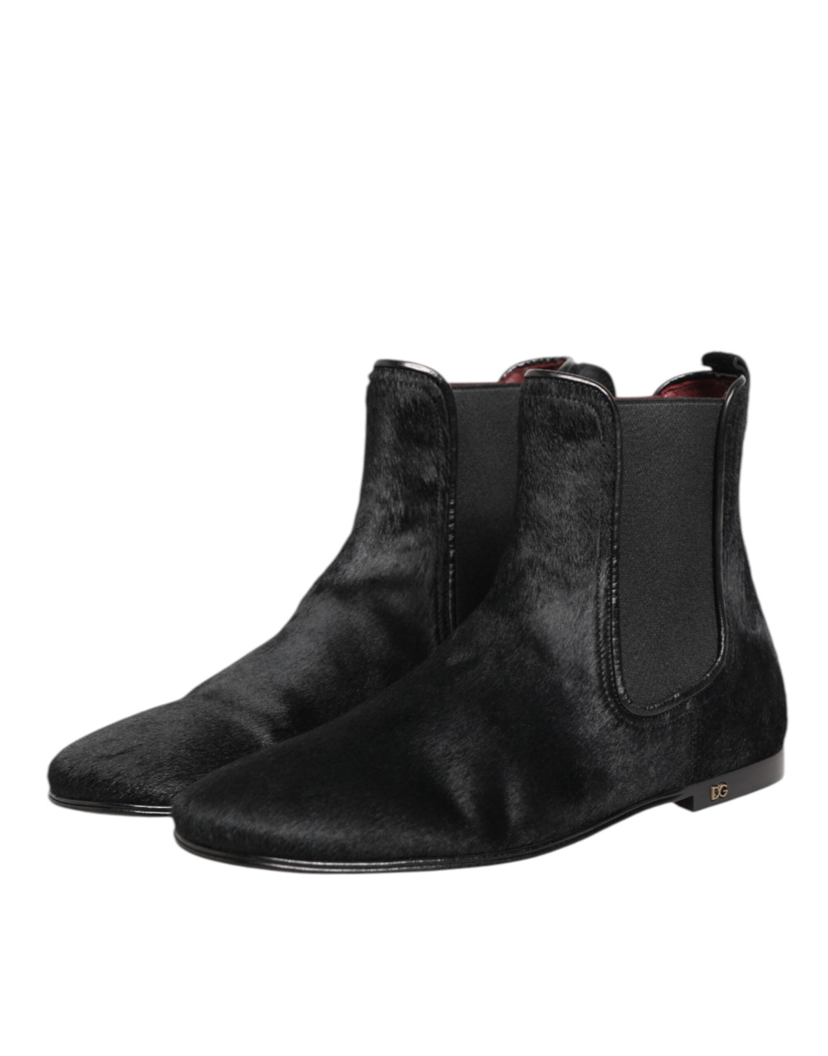 Step into opulence with Dolce & Gabbana Black Leather Fur Chelsea Boots, where exquisite craftsmanship and luxurious materials elevate your style to new heights.