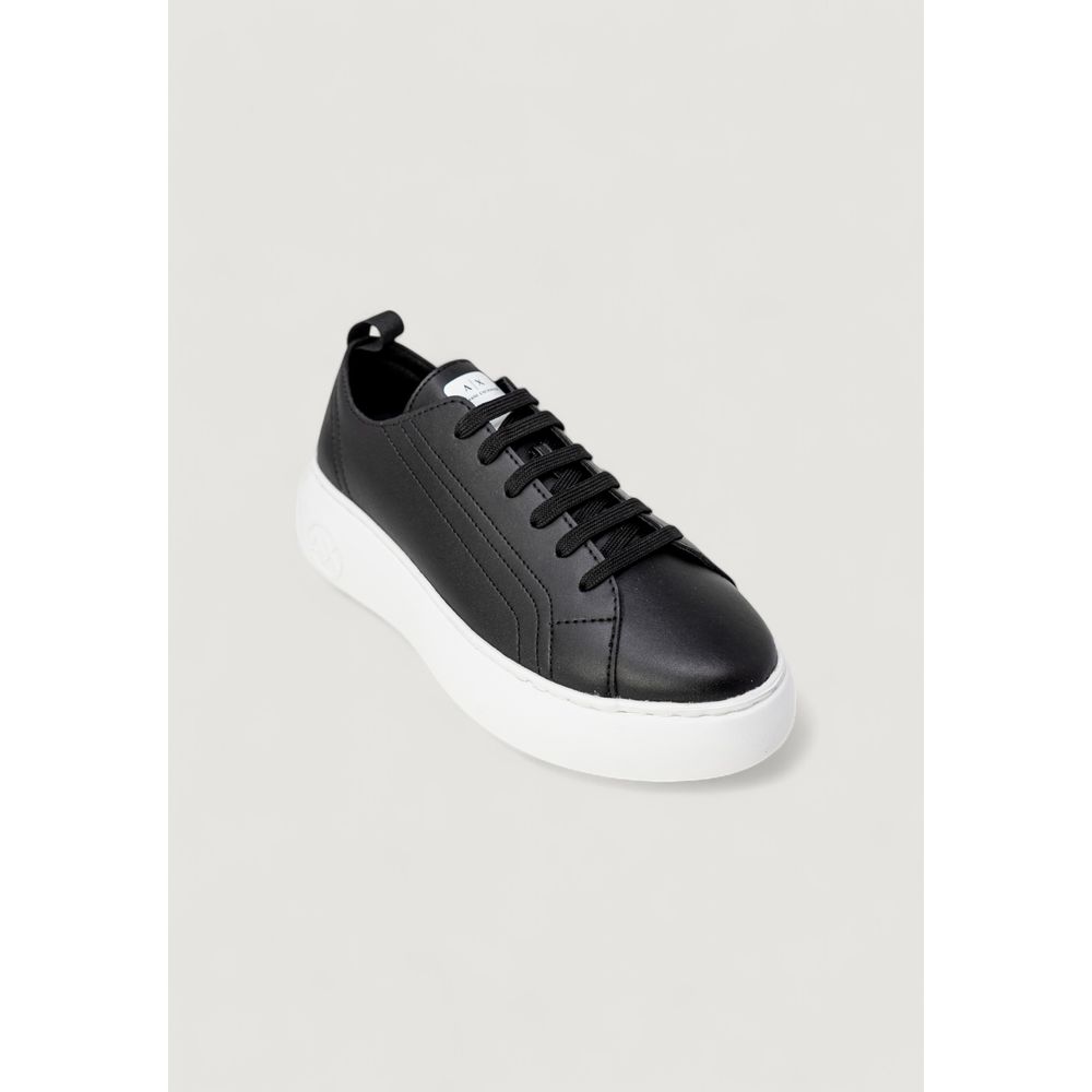 Indulge in the exquisite Armani Exchange Black Artificial Leather Low Top Sneakers, where eco-leather craftsmanship meets timeless luxury for the discerning fashionista.