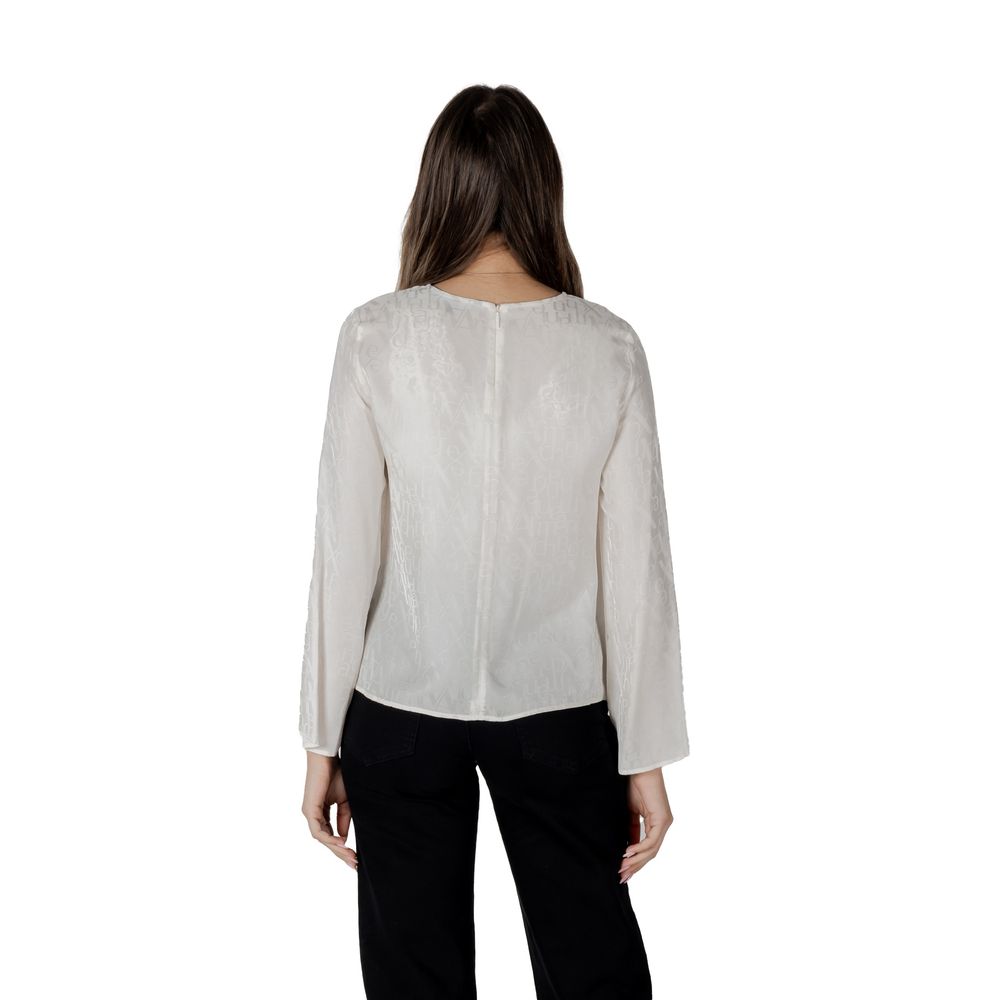 Elevate your wardrobe with the Armani Exchange Cream Viscose Blouse from the SS25 collection, crafted for luxurious elegance and effortless sophistication.