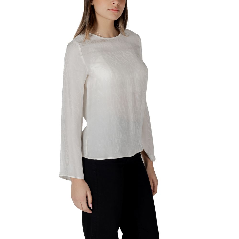 Elevate your wardrobe with the Armani Exchange Cream Viscose Blouse from the SS25 collection, where exquisite craftsmanship meets luxurious softness for timeless elegance.