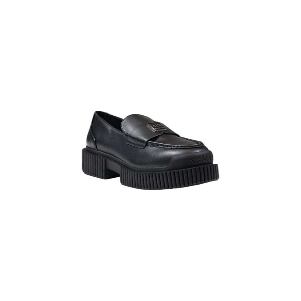 Experience the allure of Armani Exchange Black Leather Platform Pumps, crafted from premium leather for timeless elegance and unmatched sophistication, perfect for any occasion.