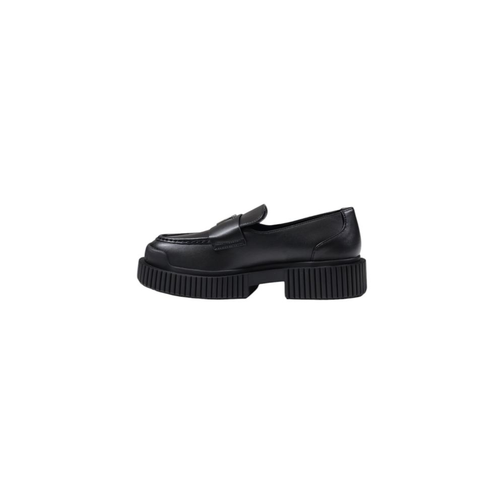Experience timeless elegance with Armani Exchange Black Leather Platform Pumps, crafted from premium leather for unparalleled sophistication and effortless allure.