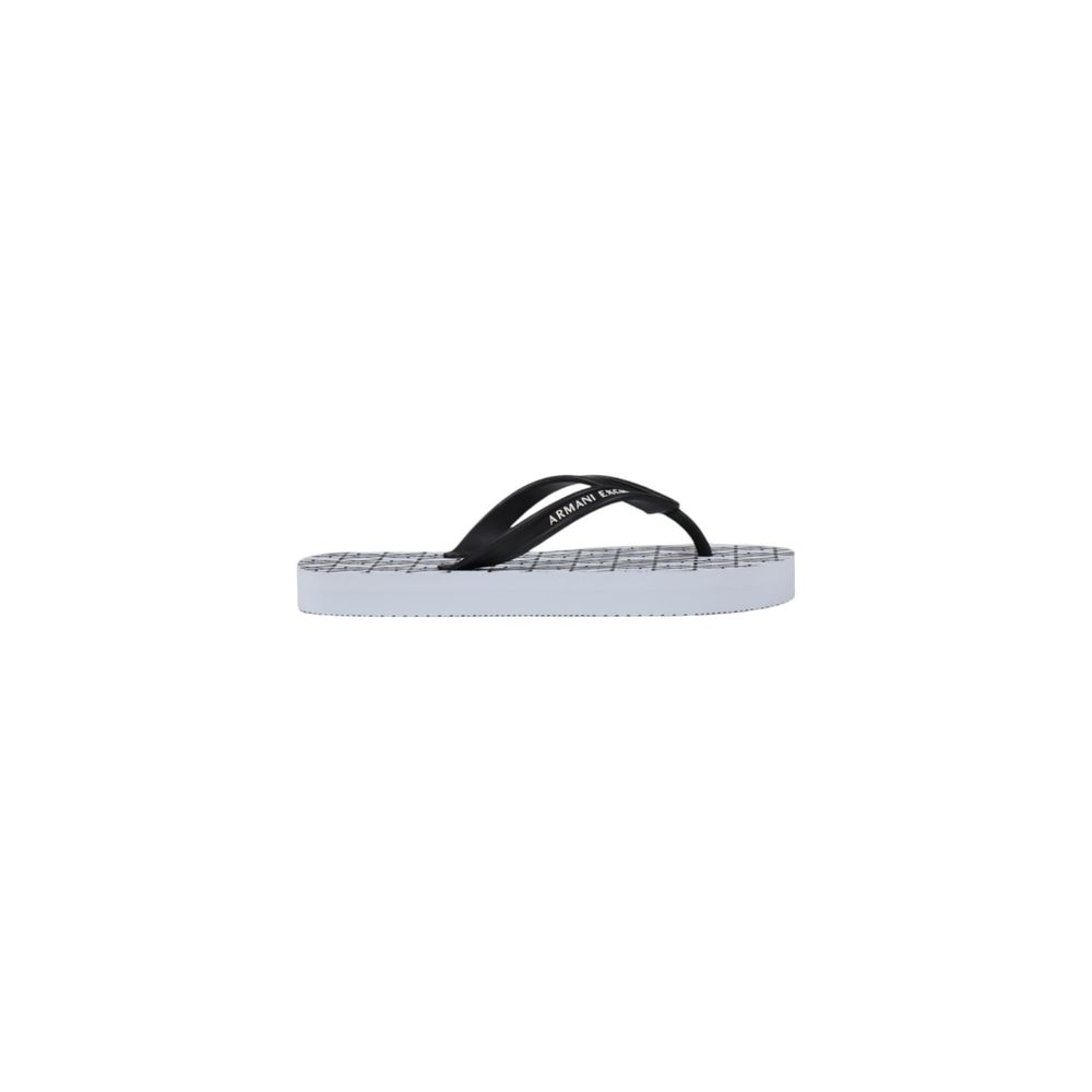 Elevate your summer style with Armani Exchange White Rubber Flip-Flop Sandals, crafted from premium rubber for luxurious comfort and effortless elegance.