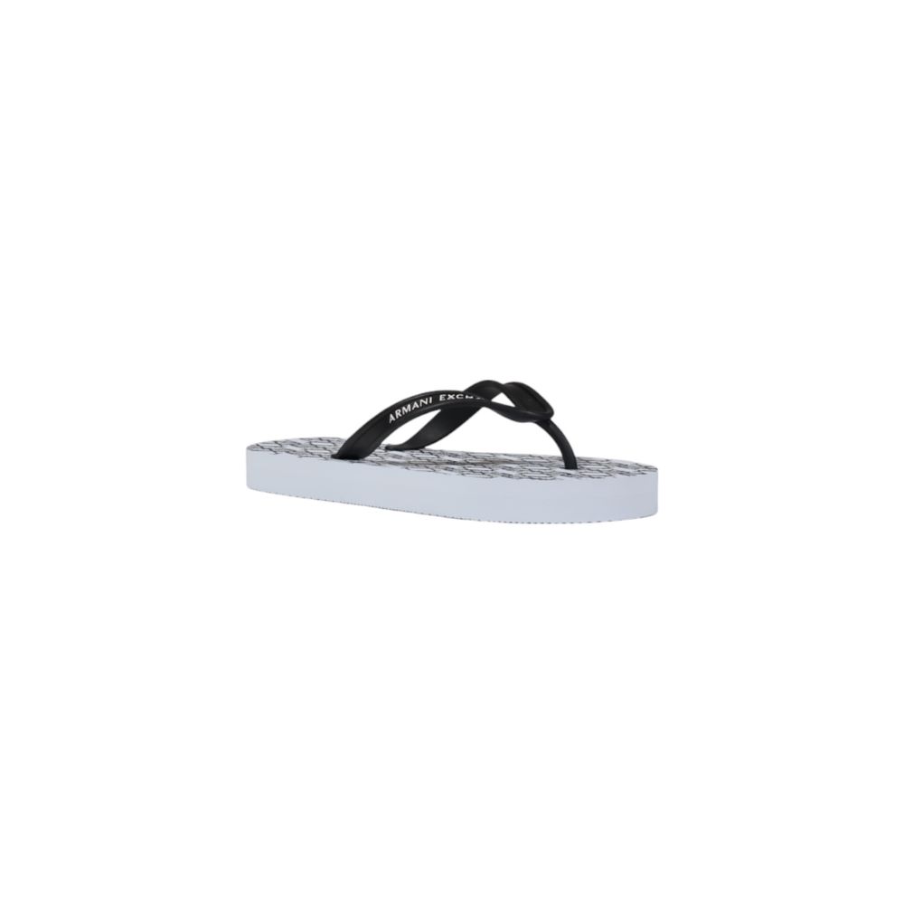 Experience the allure of Armani Exchange White Rubber Flip-Flop Sandals, crafted from premium rubber for effortless elegance and luxurious summer sophistication.