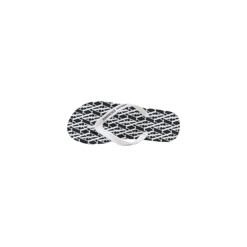 Elevate your summer elegance with Armani Exchange Black And White Rubber Flip-Flop Sandals, crafted from luxurious rubber for unparalleled comfort and sophistication.