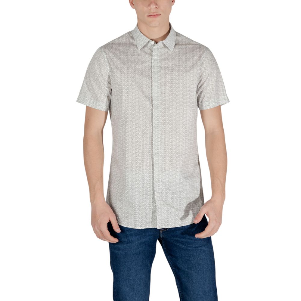Elevate your wardrobe with the Armani Exchange Cream Cotton Shortsleeve Shirt, a luxurious blend of cotton and elastane, perfect for sophisticated occasions.