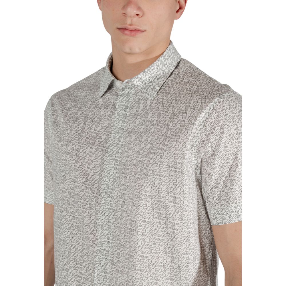 Elevate your wardrobe with the Armani Exchange Cream Cotton Shortsleeve Shirt, a blend of luxurious cotton and refined design, perfect for sophisticated occasions.
