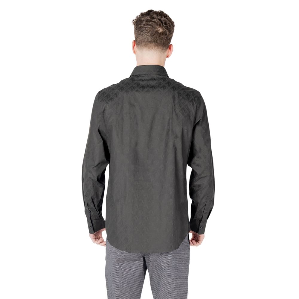 Discover the Armani Exchange Black Cotton Dress Shirt from the SS25 collection, a luxurious blend of refined craftsmanship and premium cotton for timeless elegance.
