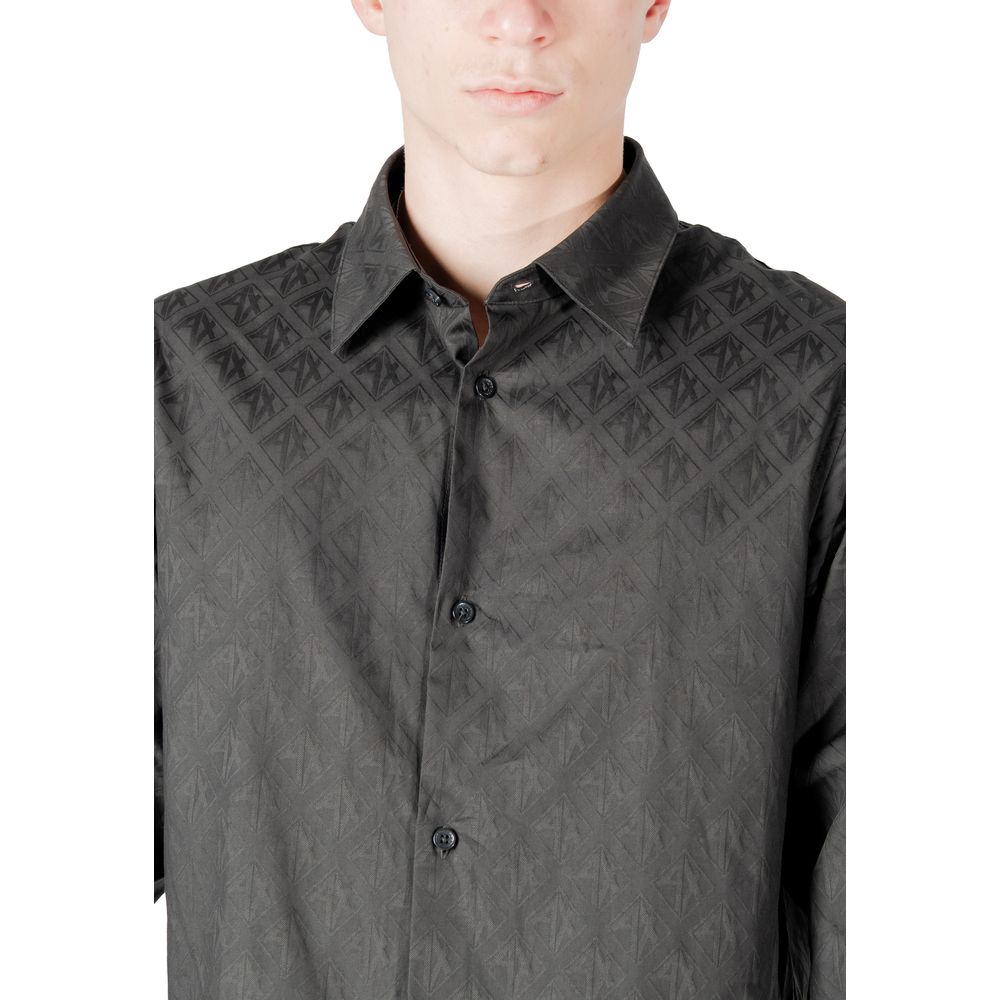Elevate your wardrobe with the Armani Exchange Black Cotton Dress Shirt from the SS25 collection, a timeless blend of refined craftsmanship and luxurious comfort.