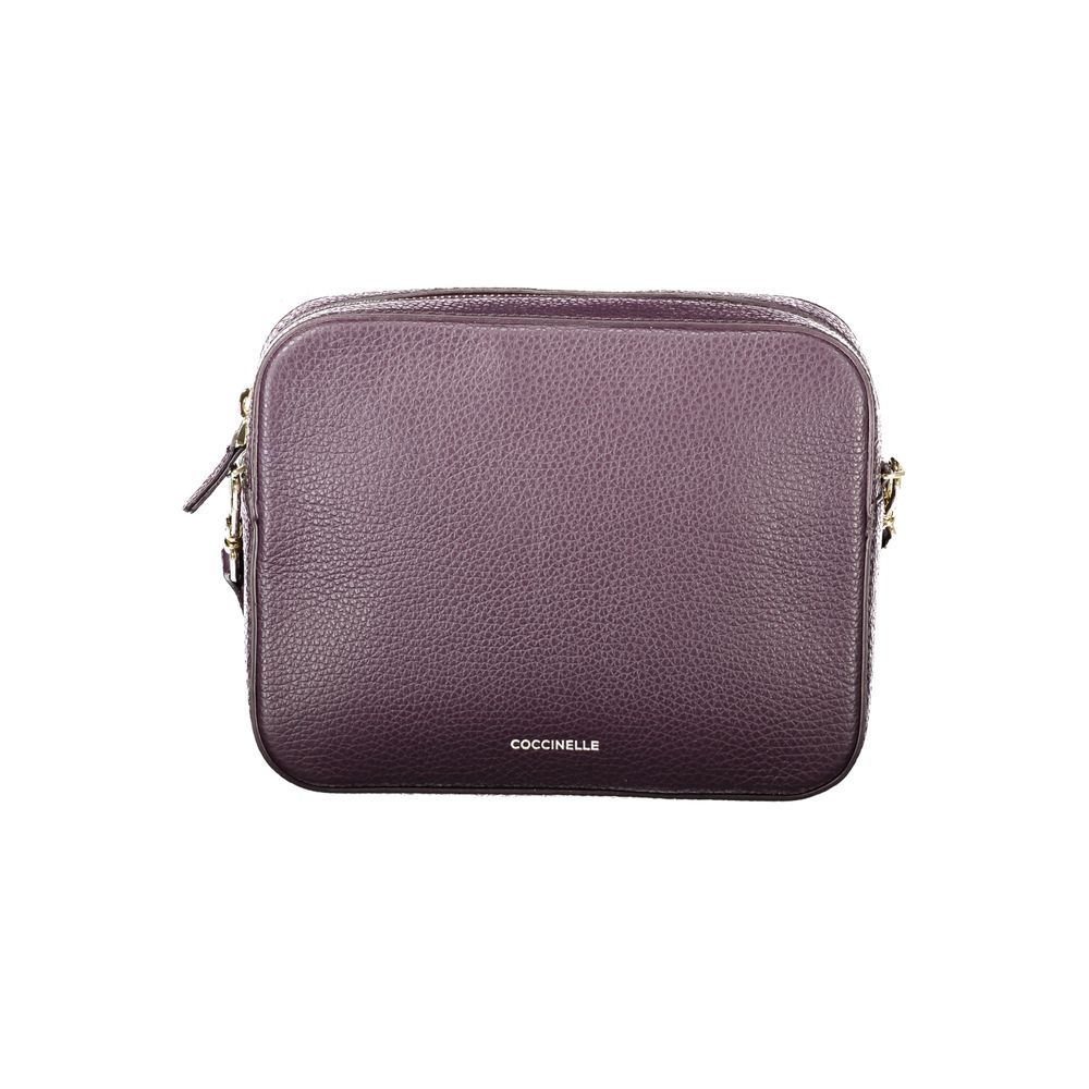 Discover the Coccinelle Purple Leather Mini Tebe Bag, a masterpiece of Italian craftsmanship that embodies luxury and sophistication for the discerning individual.