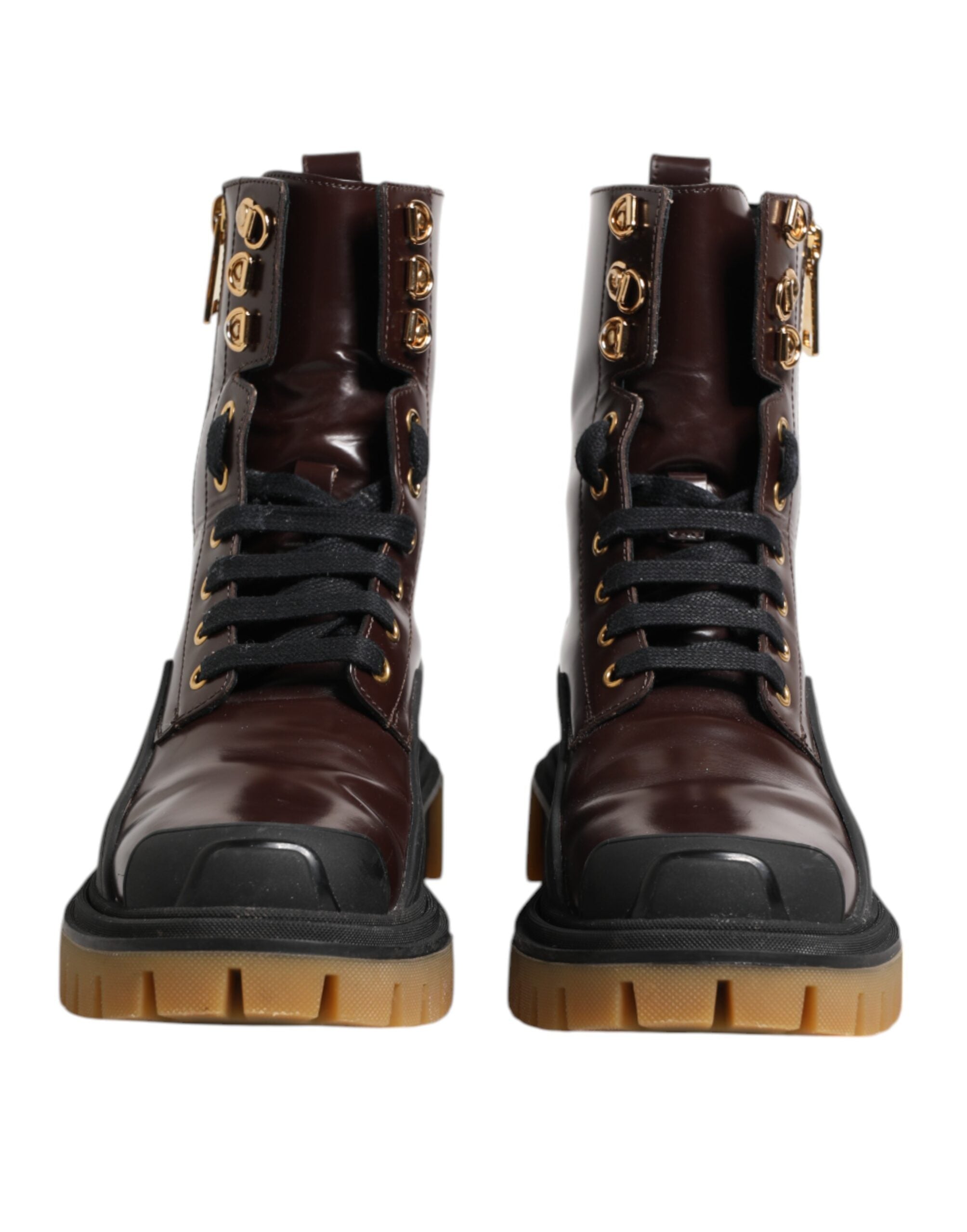 Indulge in the exquisite Dolce & Gabbana Maroon Leather Mid Calf Biker Boots, crafted in Italy from luxurious calf leather, blending timeless elegance with modern allure.