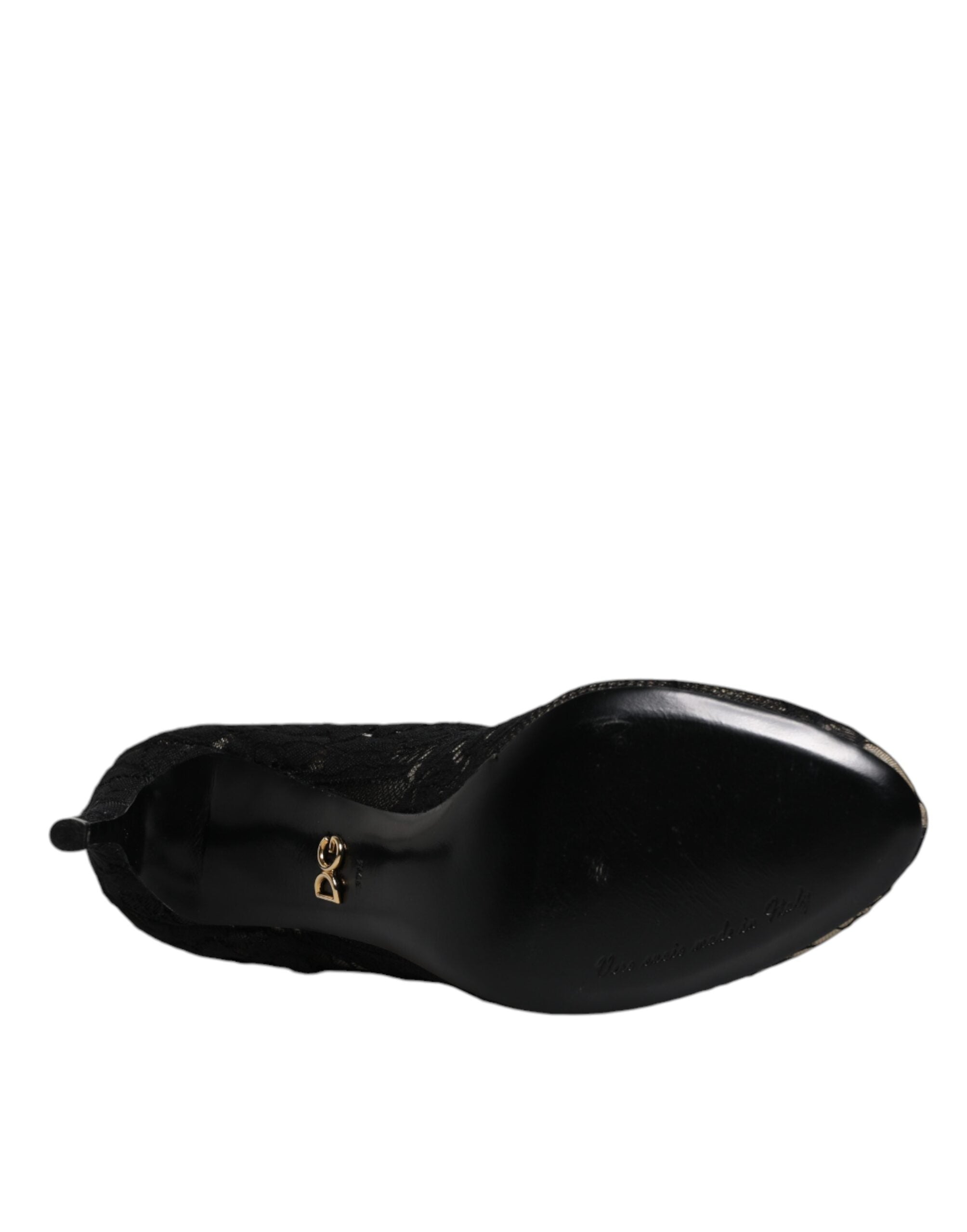 Experience the allure of Dolce & Gabbana's Black Lace Stretch Heels, where exquisite craftsmanship meets sensual elegance, elevating your style to new heights.