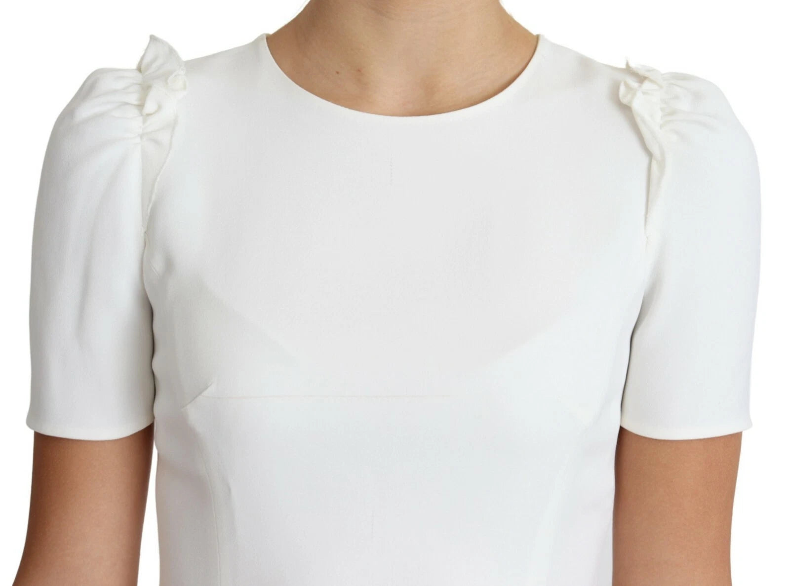 Elevate your wardrobe with the Dolce & Gabbana White Viscose Acetate Short Sleeve Blouse, a masterpiece of Italian craftsmanship that embodies timeless elegance and modern allure.