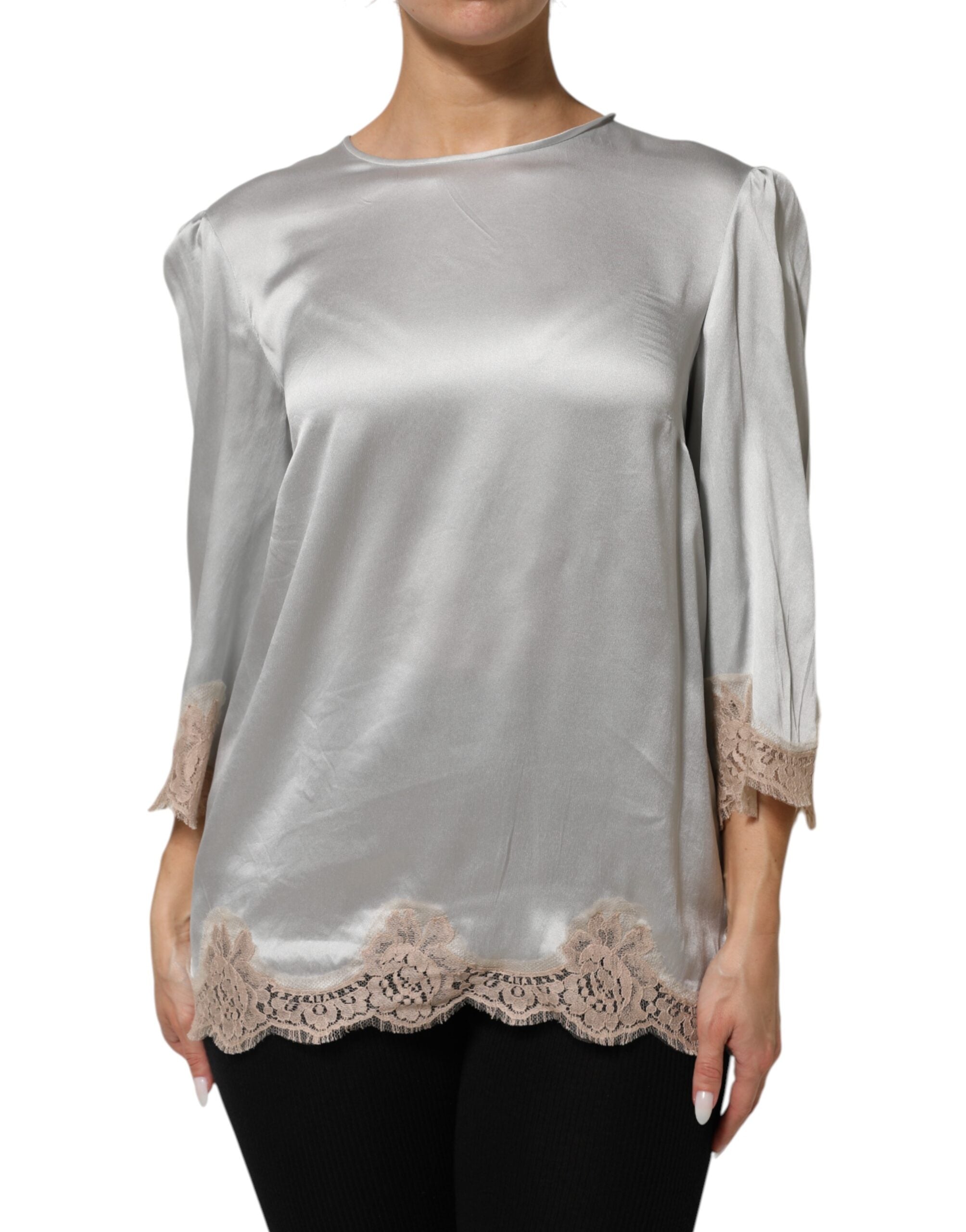 Indulge in the exquisite elegance of Dolce & Gabbana's Gray Silk Satin Floral Lace Long Sleeve Top, a timeless masterpiece crafted in Italy for the discerning individual.