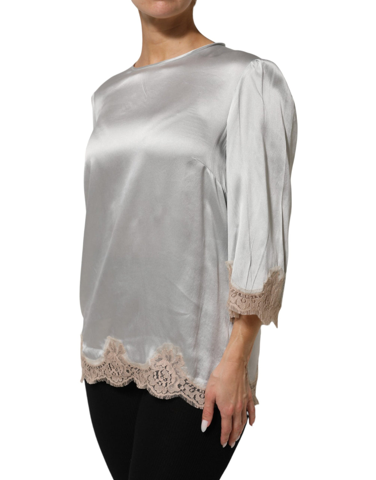 Experience the allure of Dolce & Gabbana's Gray Silk Satin Floral Lace Long Sleeve Top, a masterpiece of Italian craftsmanship that embodies timeless elegance and sophistication.