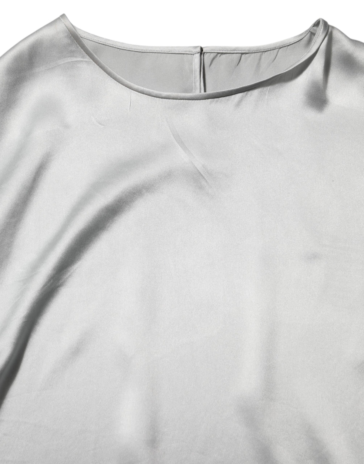 Indulge in the exquisite elegance of Dolce & Gabbana's Gray Silk Satin Floral Lace Long Sleeve Top, a testament to Italian craftsmanship and timeless allure.