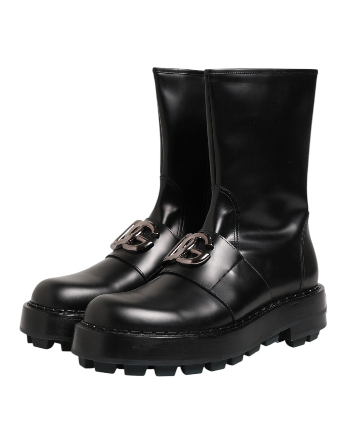 Indulge in the allure of Dolce & Gabbana's Black Logo Plaque Mid Calf Biker Boots, where exquisite craftsmanship meets luxurious black calf leather for an unparalleled statement.