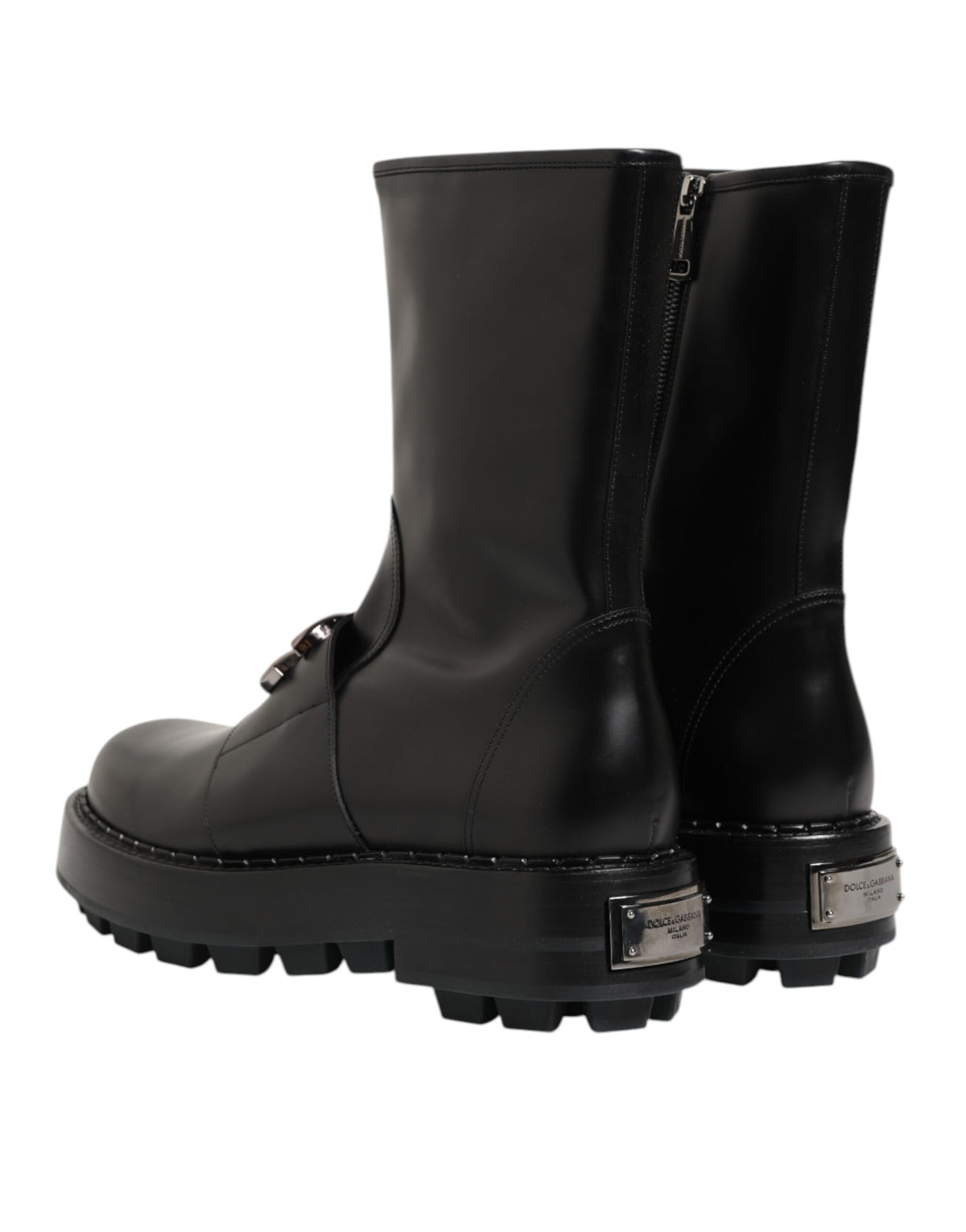 Experience the allure of Dolce & Gabbana's Black Logo Plaque Mid Calf Biker Boots, crafted from premium black calf leather, embodying luxury and timeless elegance.