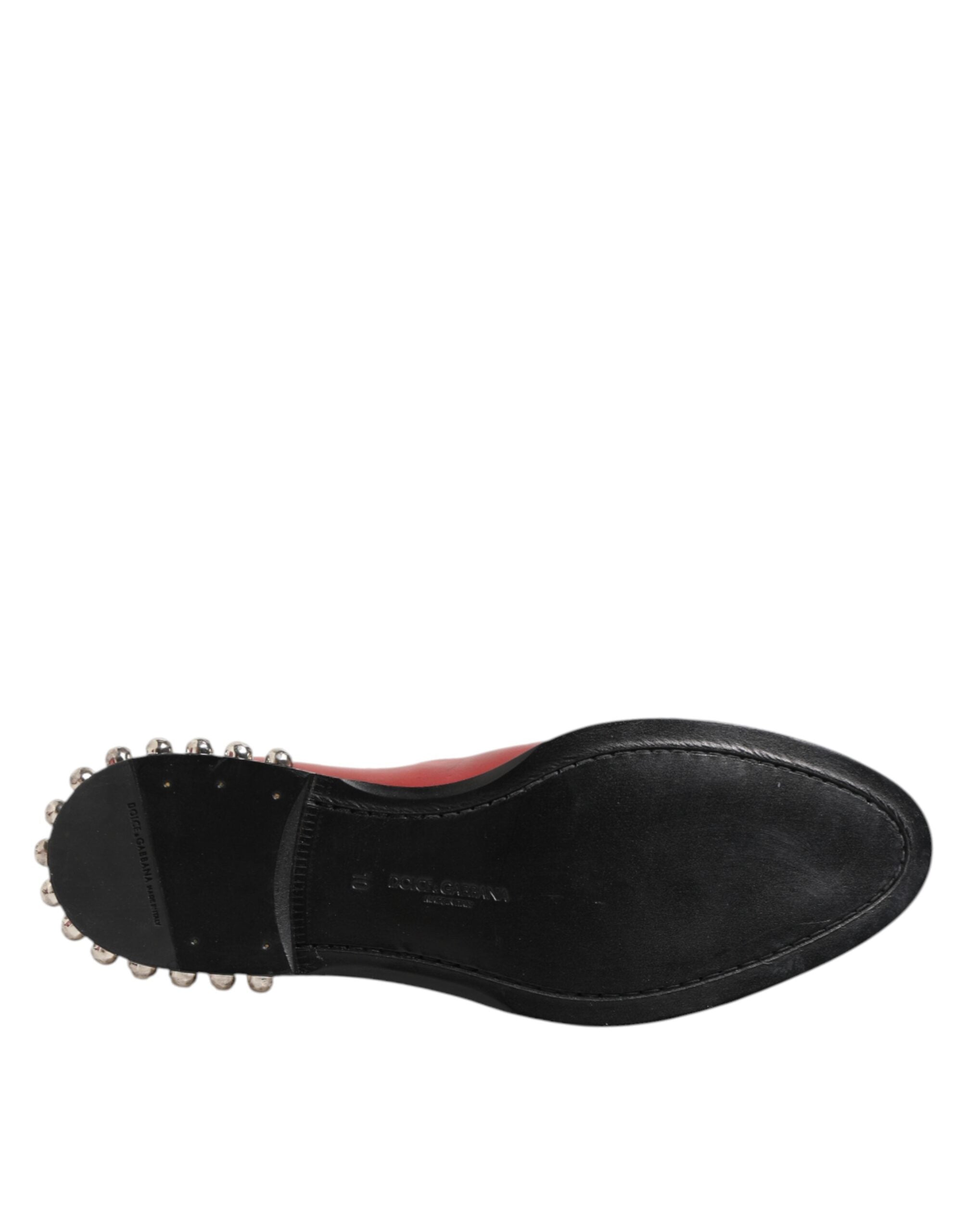Elevate your style with the Dolce & Gabbana Red Studded Chelsea Ankle Boots, crafted from luxurious calf leather, embodying bold elegance and exquisite Italian craftsmanship.