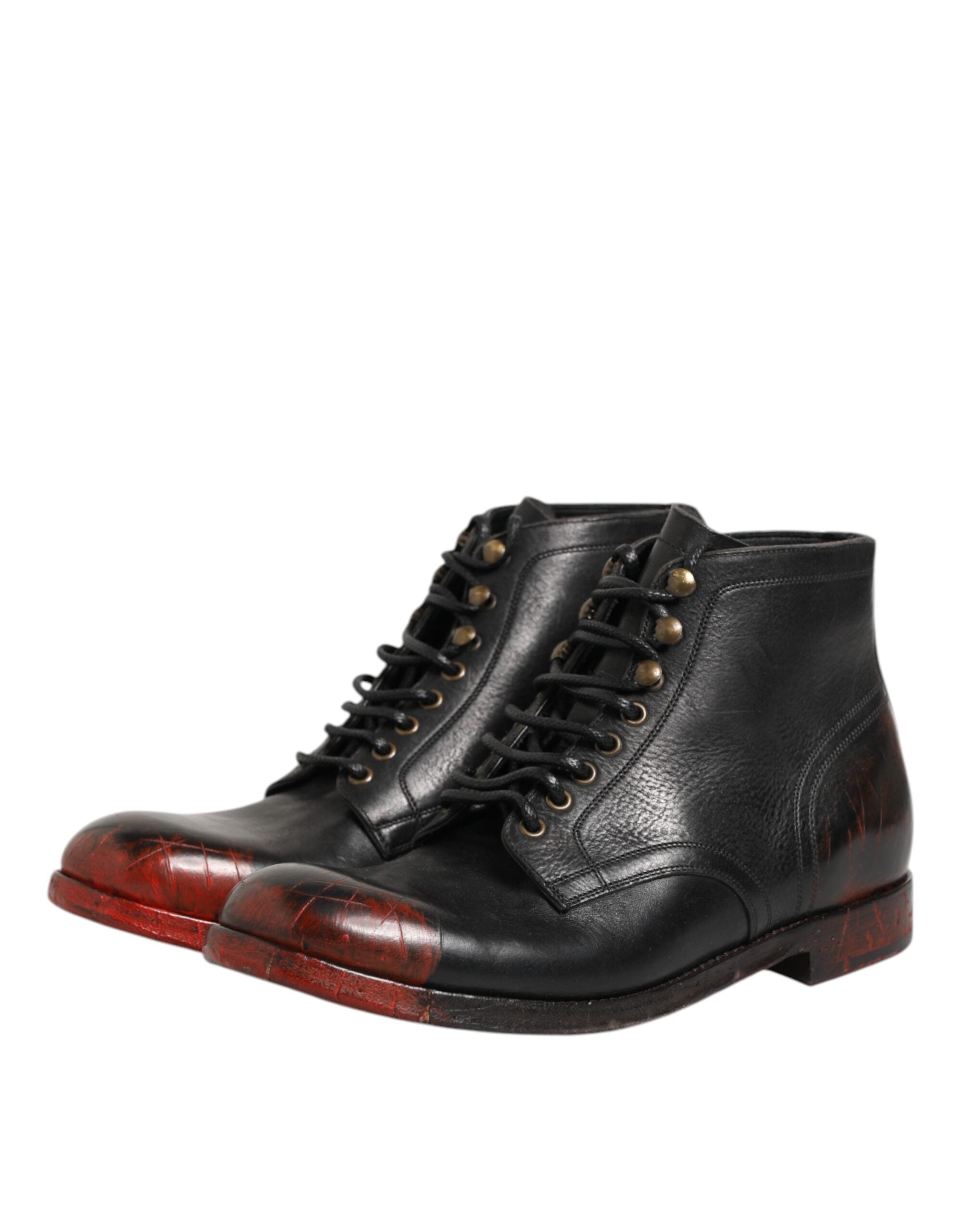 Elevate your style with Dolce & Gabbana's Black Red Lace Up Short Ankle Boots, crafted from luxurious calf leather, embodying bold elegance and timeless sophistication.