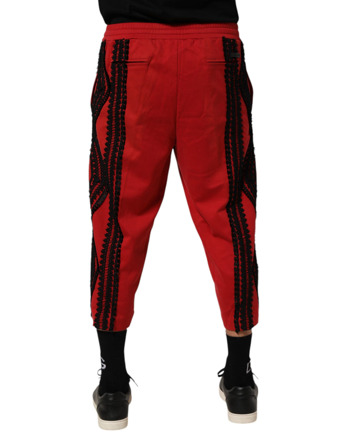 Indulge in the artistry of Dolce & Gabbana's Red Embroidered Casual Cropped Trouser Pants, where exquisite craftsmanship meets vibrant elegance for the discerning individual.