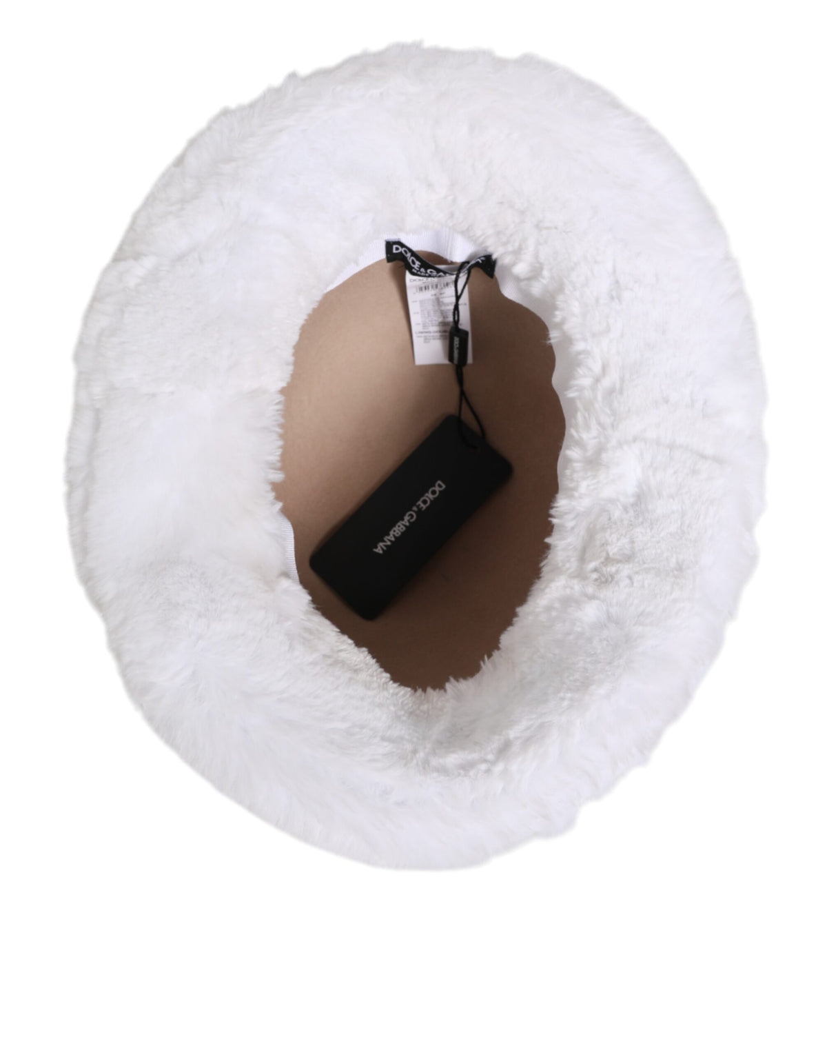 Indulge in the exquisite Dolce & Gabbana White Modacrylic Fur Bucket Hat, a luxurious statement of craftsmanship and elegance, perfect for the discerning individual.