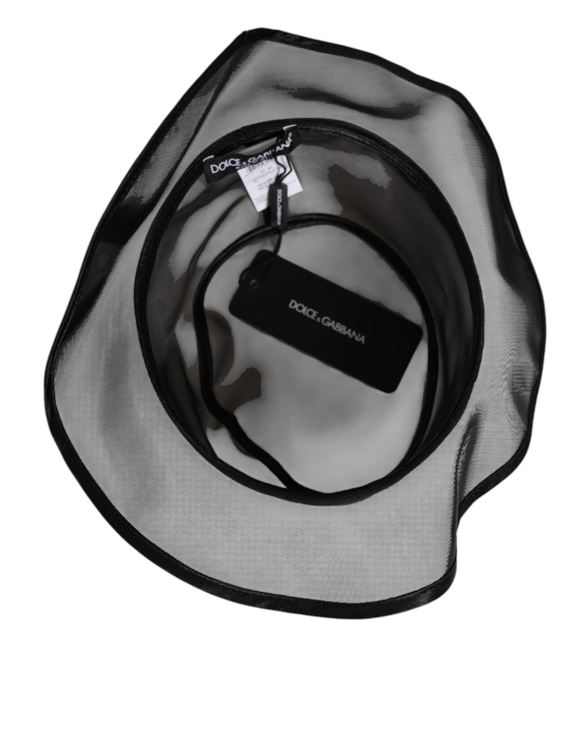 Elevate your winter wardrobe with the Dolce & Gabbana Black Silk Mesh Bucket Hat, a luxurious blend of silk and plush fur, embodying sophistication and modern elegance.