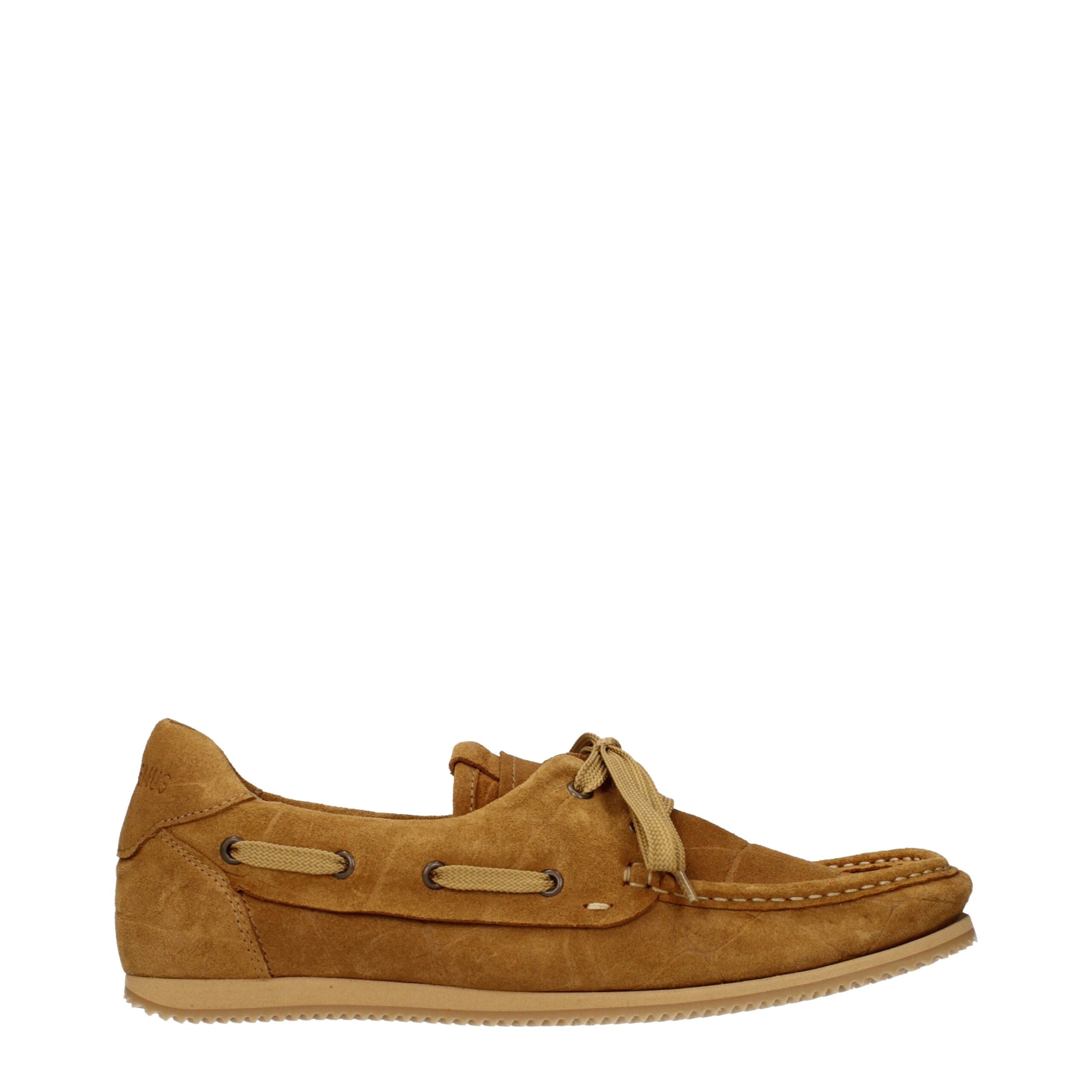 Indulge in the exquisite Jacquemus Brown Leather Slip-On Loafers, where sumptuous suede meets meticulous craftsmanship, embodying timeless elegance for every occasion.