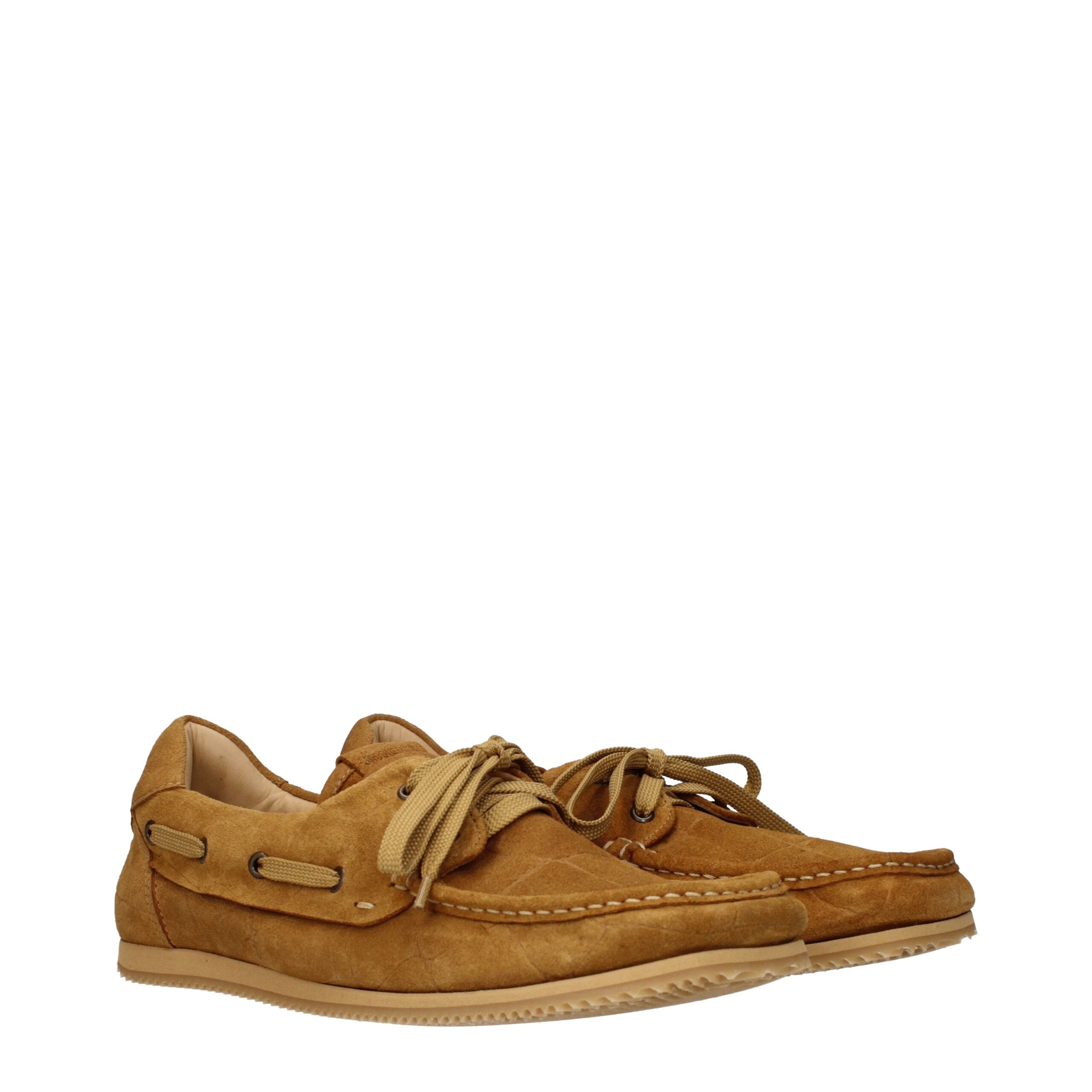 Elevate your style with Jacquemus Brown Leather Slip-On Loafers, where exquisite craftsmanship meets luxurious suede, perfect for any sophisticated occasion.