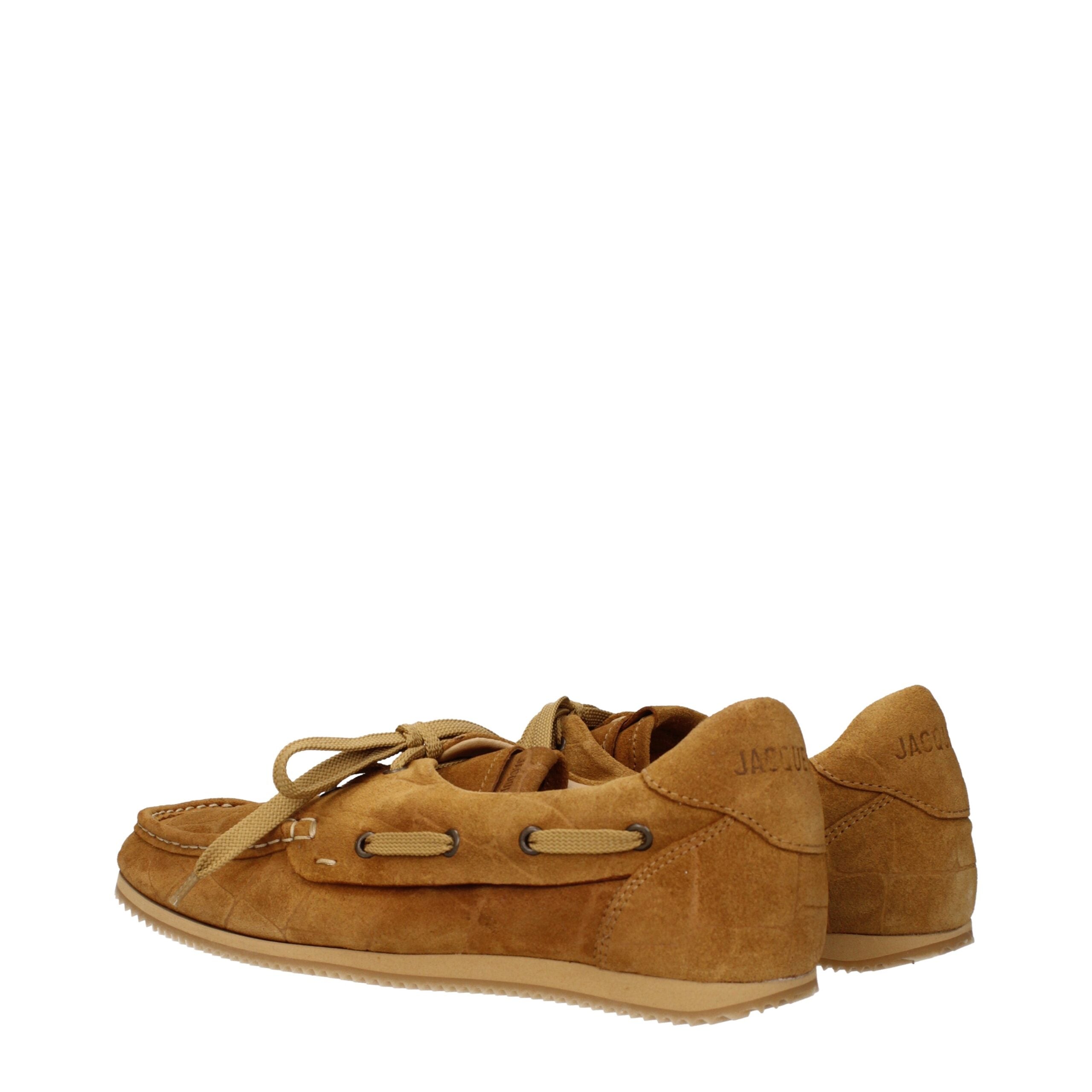 Experience the epitome of luxury with Jacquemus Brown Leather Slip-On Loafers, crafted from premium leather, embodying timeless elegance for the discerning individual.