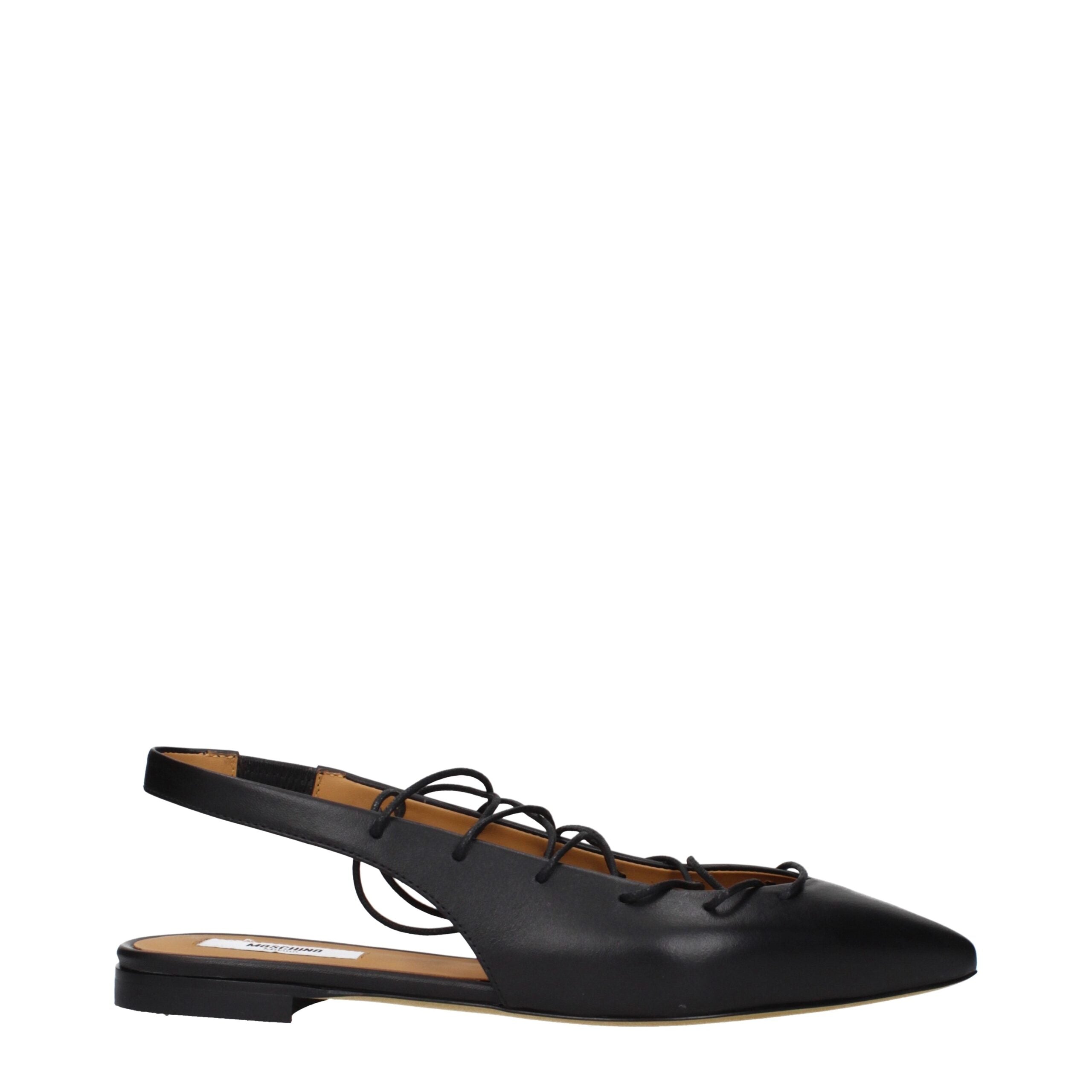 Step into unparalleled elegance with Moschino Black Leather Flats, crafted from premium leather for timeless luxury and effortless sophistication in every step.