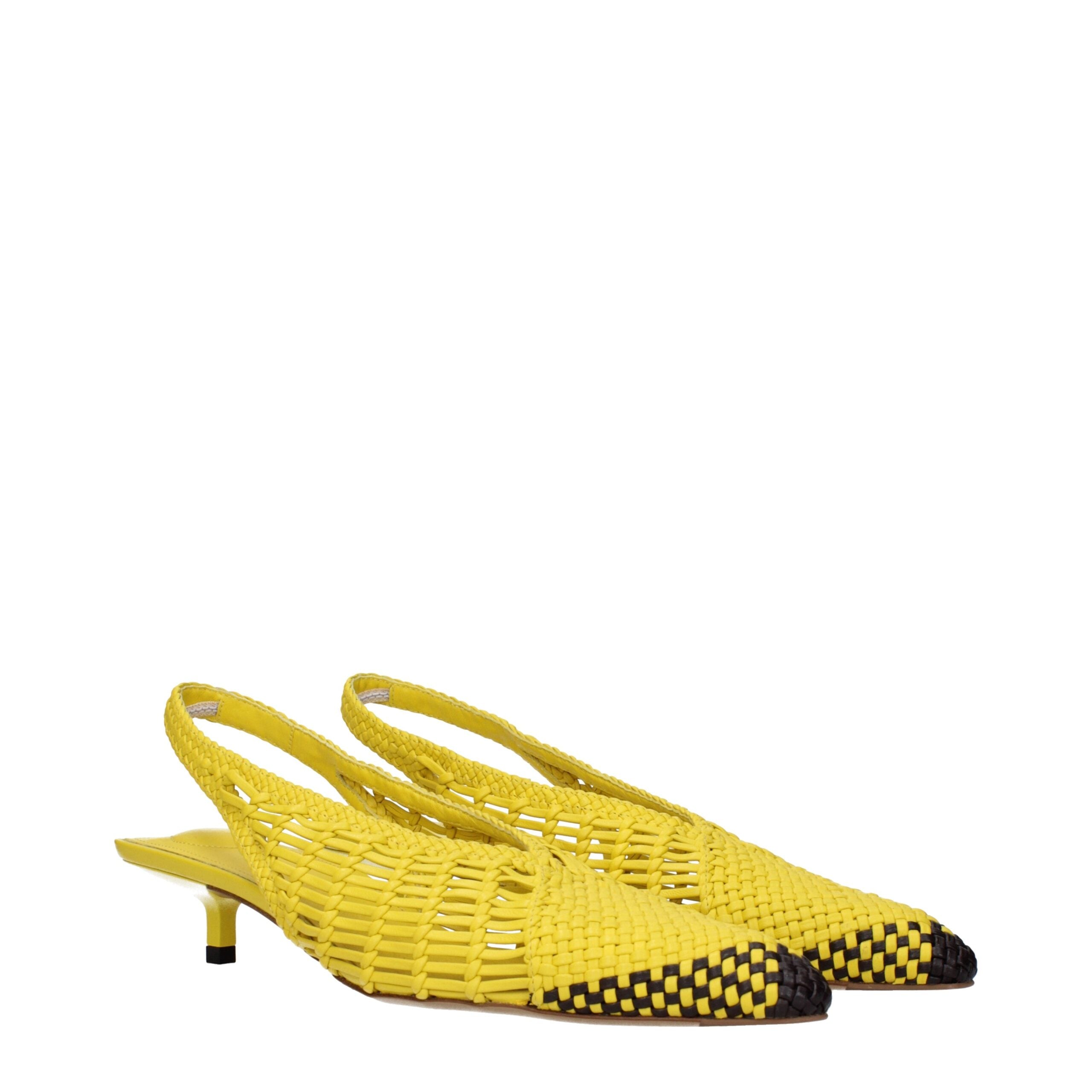 Elevate your elegance with Jacquemus Yellow Leather Flat Sandals, crafted from premium leather for timeless sophistication, perfect for the discerning individual.
