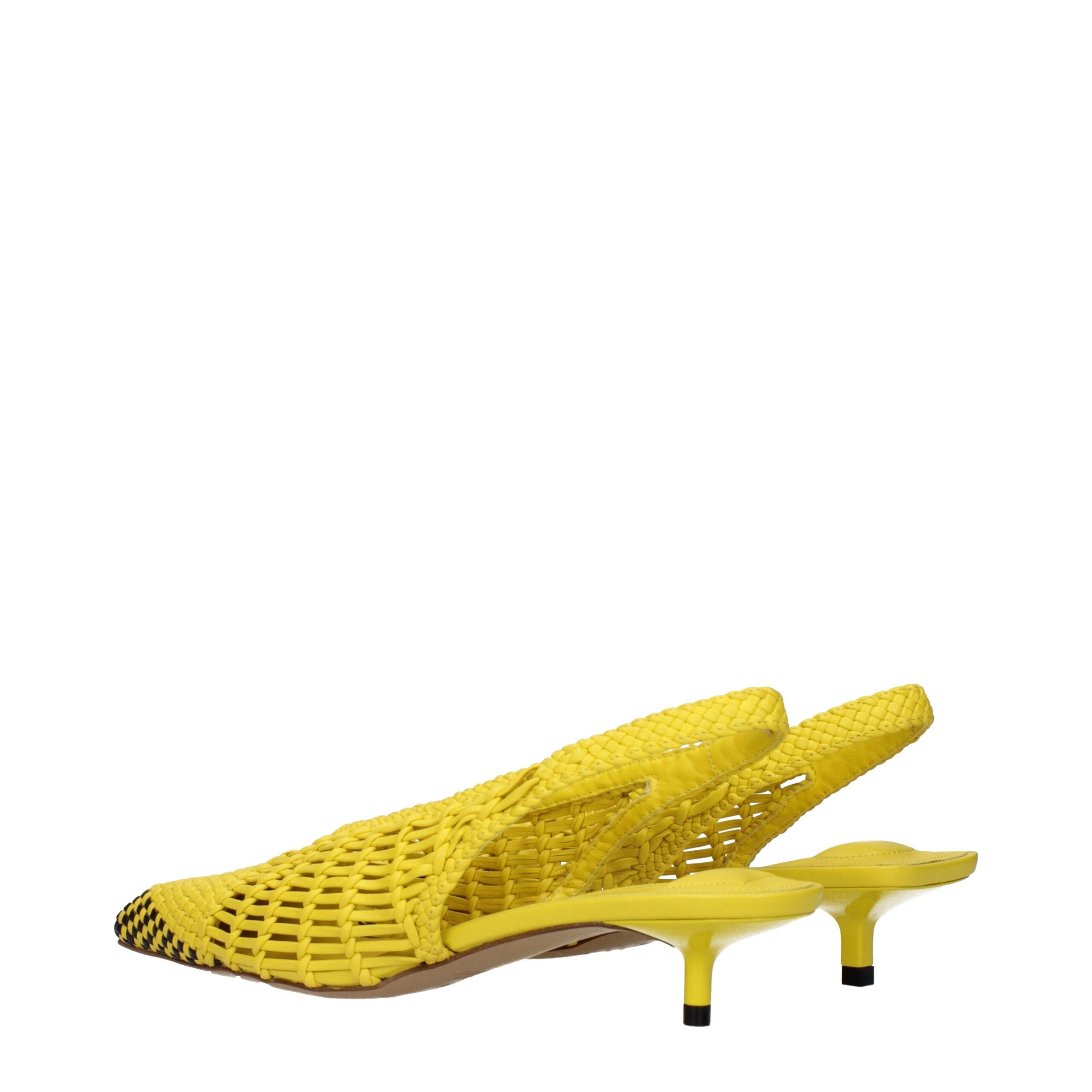 Experience the allure of Jacquemus Yellow Leather Flat Sandals, where exquisite craftsmanship meets timeless elegance, perfect for the discerning connoisseur.