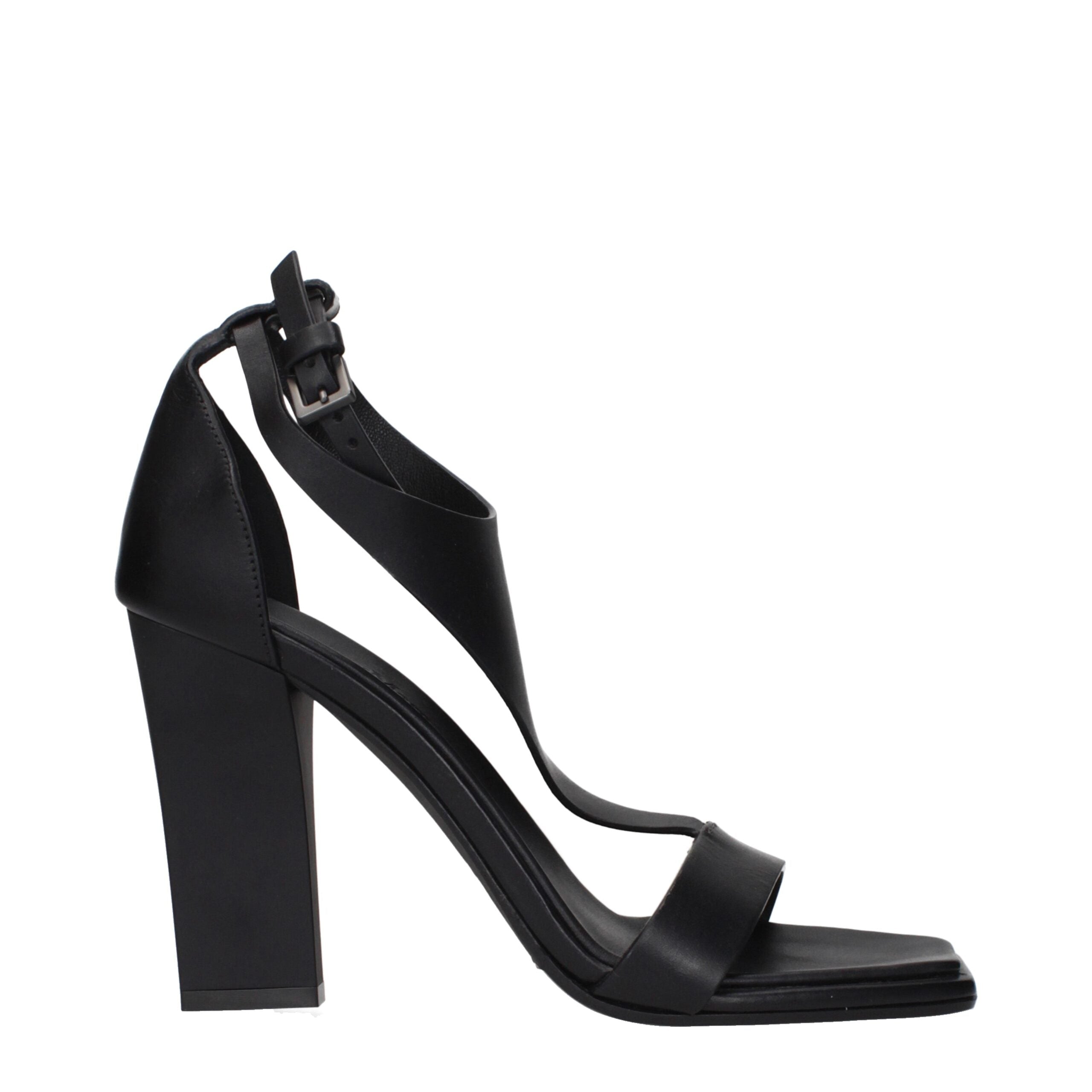 Elevate your elegance with Max Mara Black Leather Stiletto Heel Sandals, a luxurious blend of exquisite craftsmanship and timeless sophistication for every occasion.