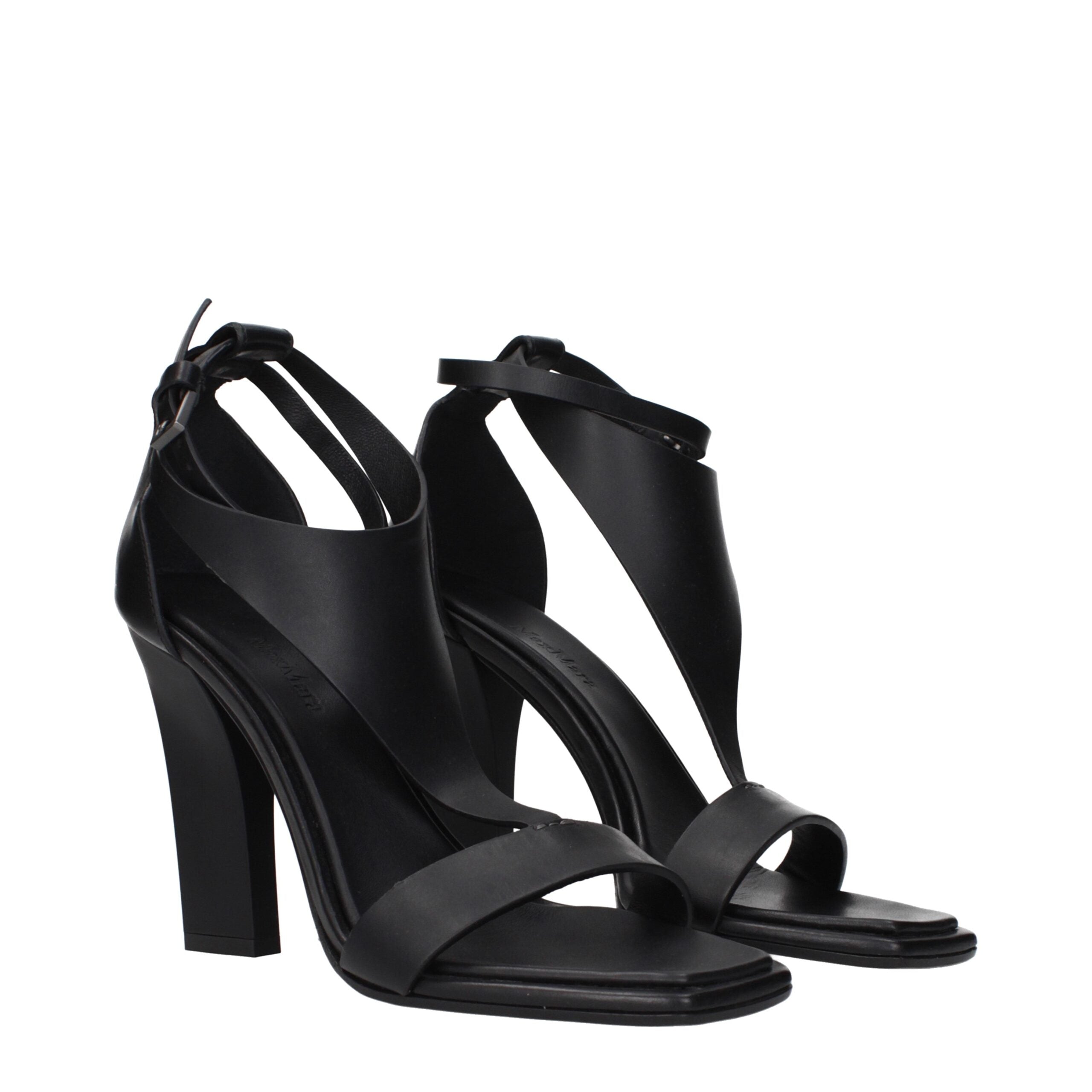 Elevate your elegance with Max Mara Black Leather Stiletto Heel Sandals, a luxurious embodiment of craftsmanship that transforms every occasion into a celebration of sophistication.