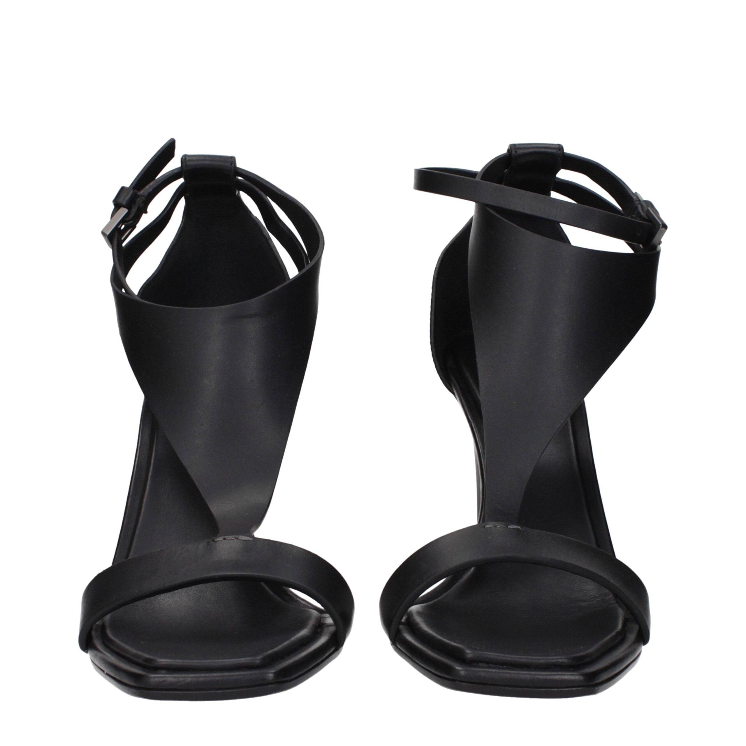 Experience the allure of Max Mara Black Leather Stiletto Heel Sandals, where exquisite craftsmanship meets timeless elegance, perfect for any luxurious occasion.