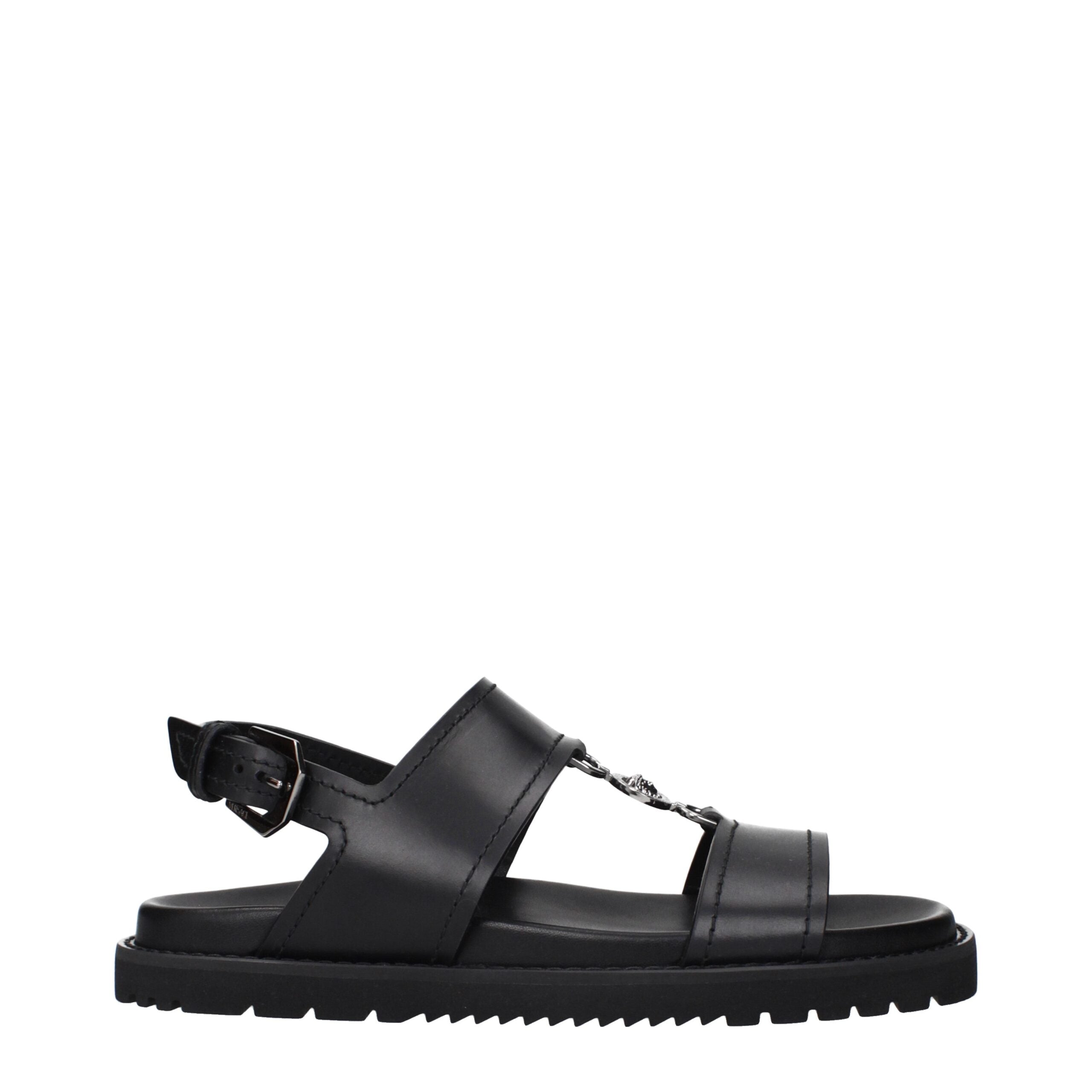 Experience the allure of Versace Black Leather Flat Sandals, where exquisite craftsmanship meets timeless elegance, perfect for those who embrace luxury and sophistication.