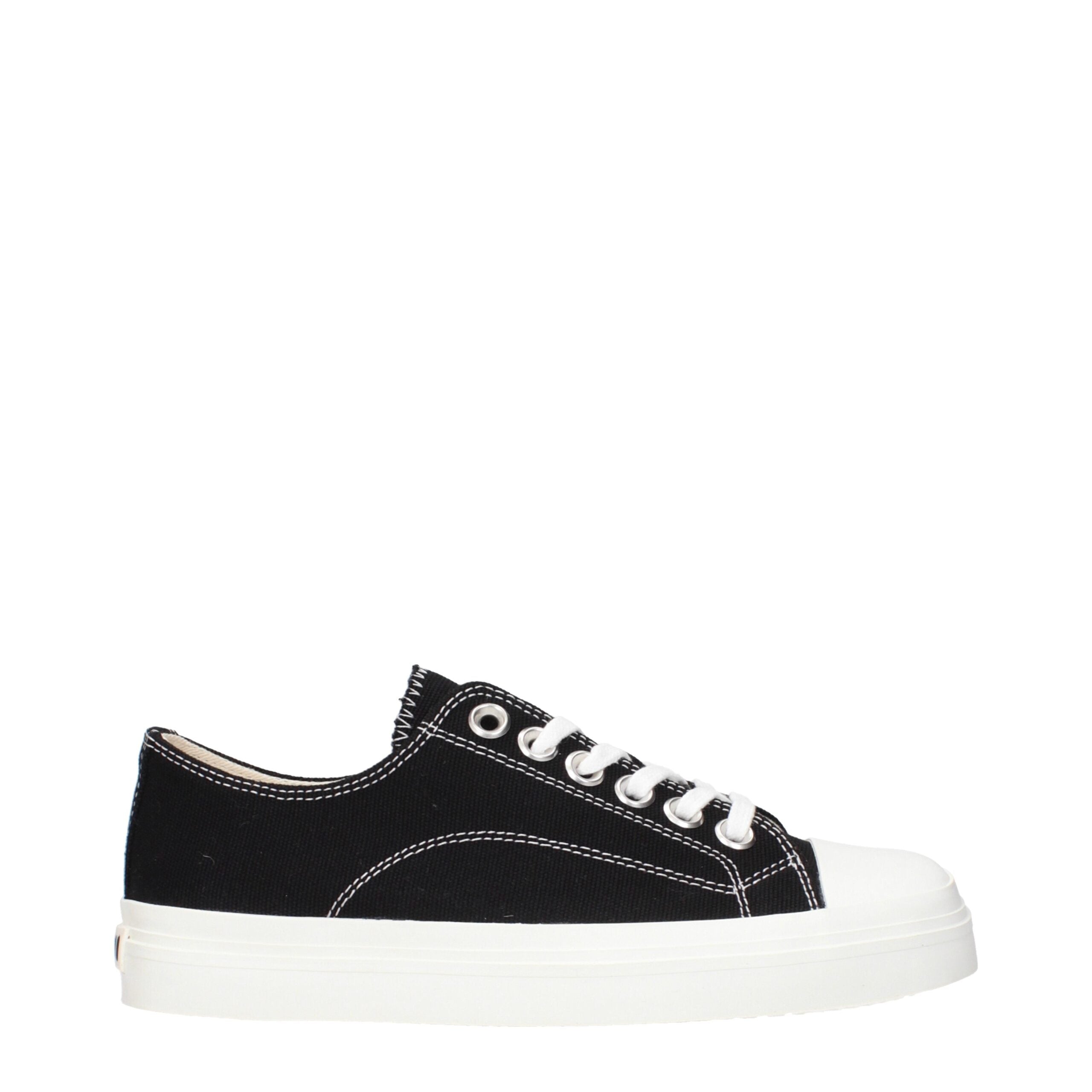 Experience the allure of Moschino Black Fabric Low Top Sneakers, where exquisite craftsmanship meets contemporary elegance, perfect for the discerning individual.