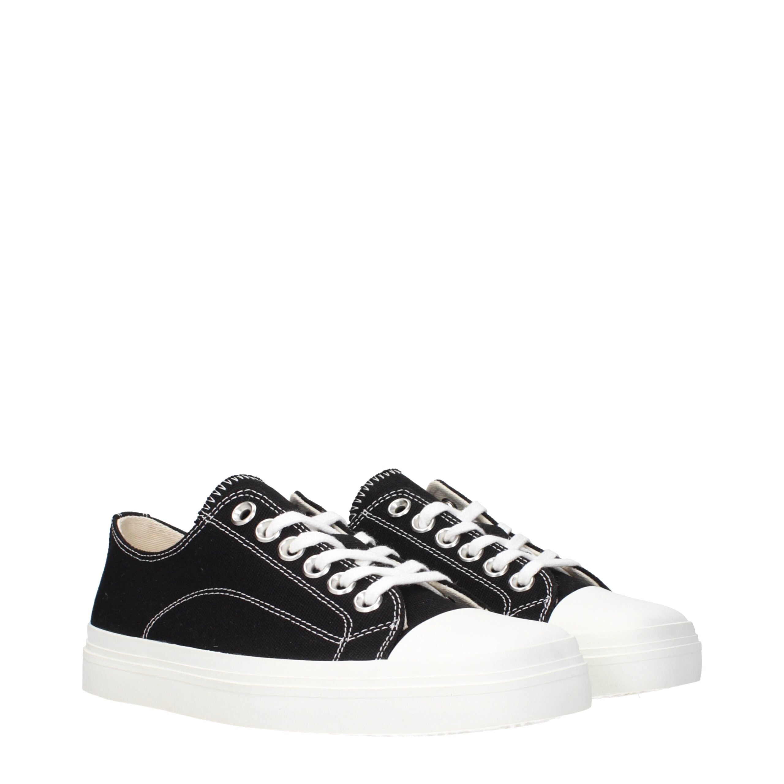 Experience the allure of Moschino Black Fabric Low Top Sneakers, where exquisite craftsmanship meets contemporary elegance, perfect for those who embody luxury and sophistication.