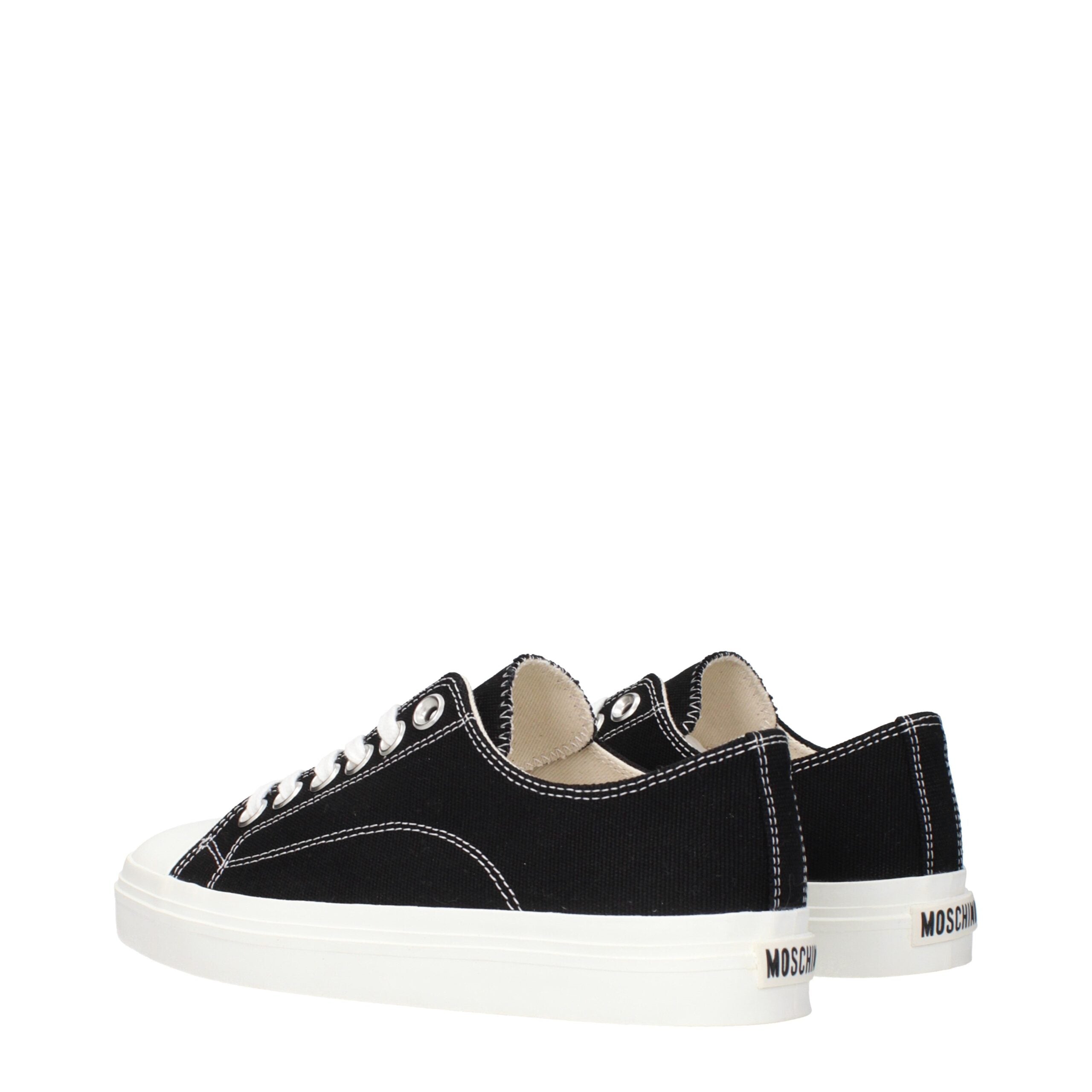Discover the Moschino Black Fabric Low Top Sneakers, where exquisite craftsmanship meets contemporary elegance, perfect for the discerning individual seeking luxury.