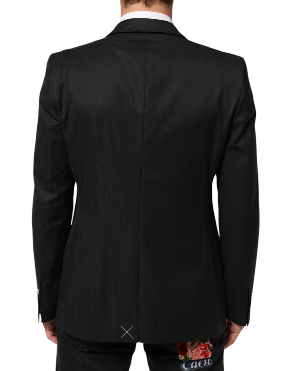 Indulge in the exquisite Dolce & Gabbana Black MARTINI Blazer, crafted from luxurious virgin wool, embodying timeless elegance and sophistication for the discerning individual.