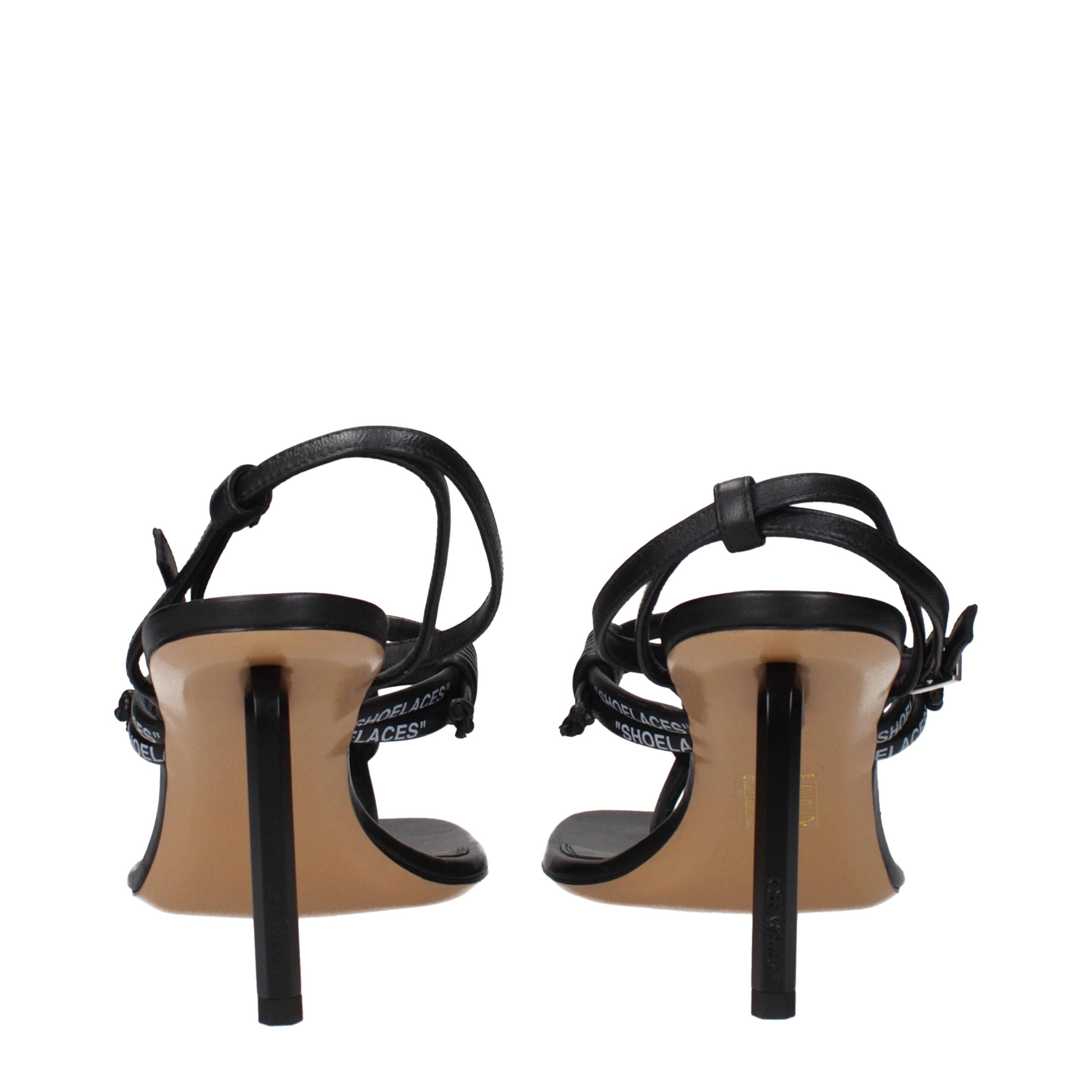 Indulge in the Off-White Black Leather Flip-Flop Sandals, where exquisite craftsmanship meets modern elegance, perfect for elevating your summer sophistication.