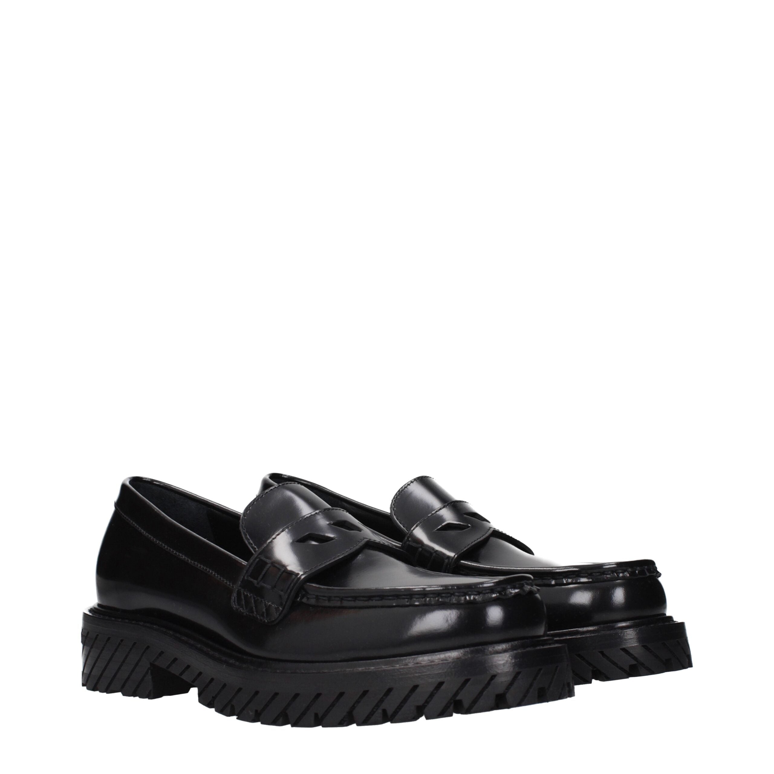 Elevate your style with Off-White Black Leather Slip-On Loafers, where exquisite craftsmanship meets timeless luxury, perfect for the discerning fashion connoisseur.