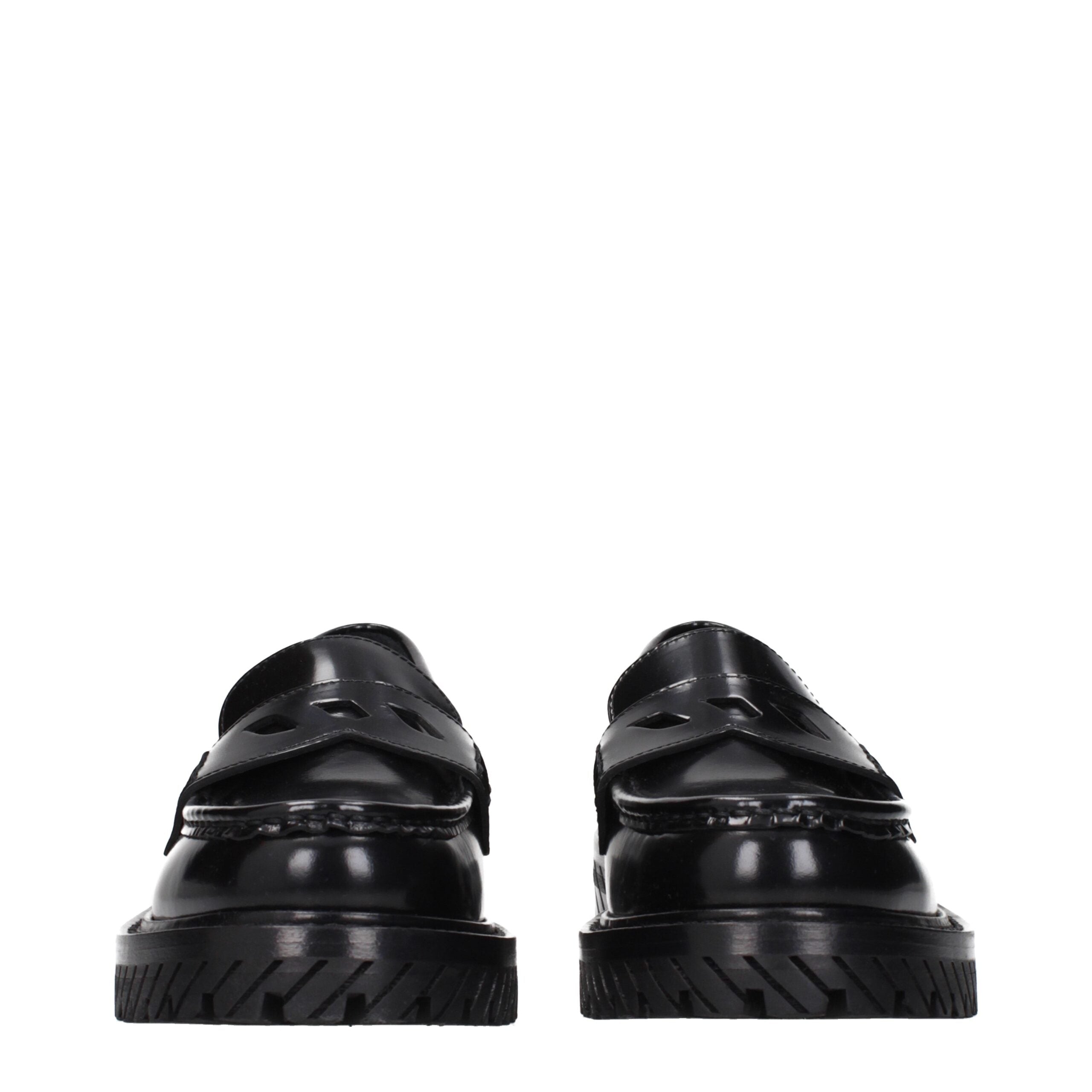 Discover the Off-White Black Leather Slip-On Loafers, where exquisite craftsmanship meets timeless luxury, perfect for the discerning fashion connoisseur.