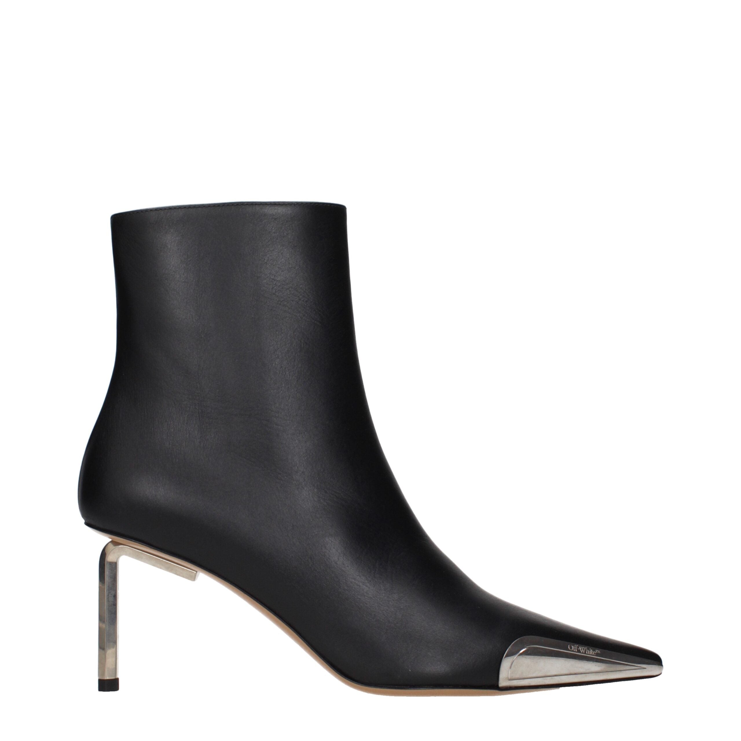 Elevate your style with Off-White Black Leather Ankle Boots, where exquisite craftsmanship meets luxurious design, perfect for the discerning fashionista.