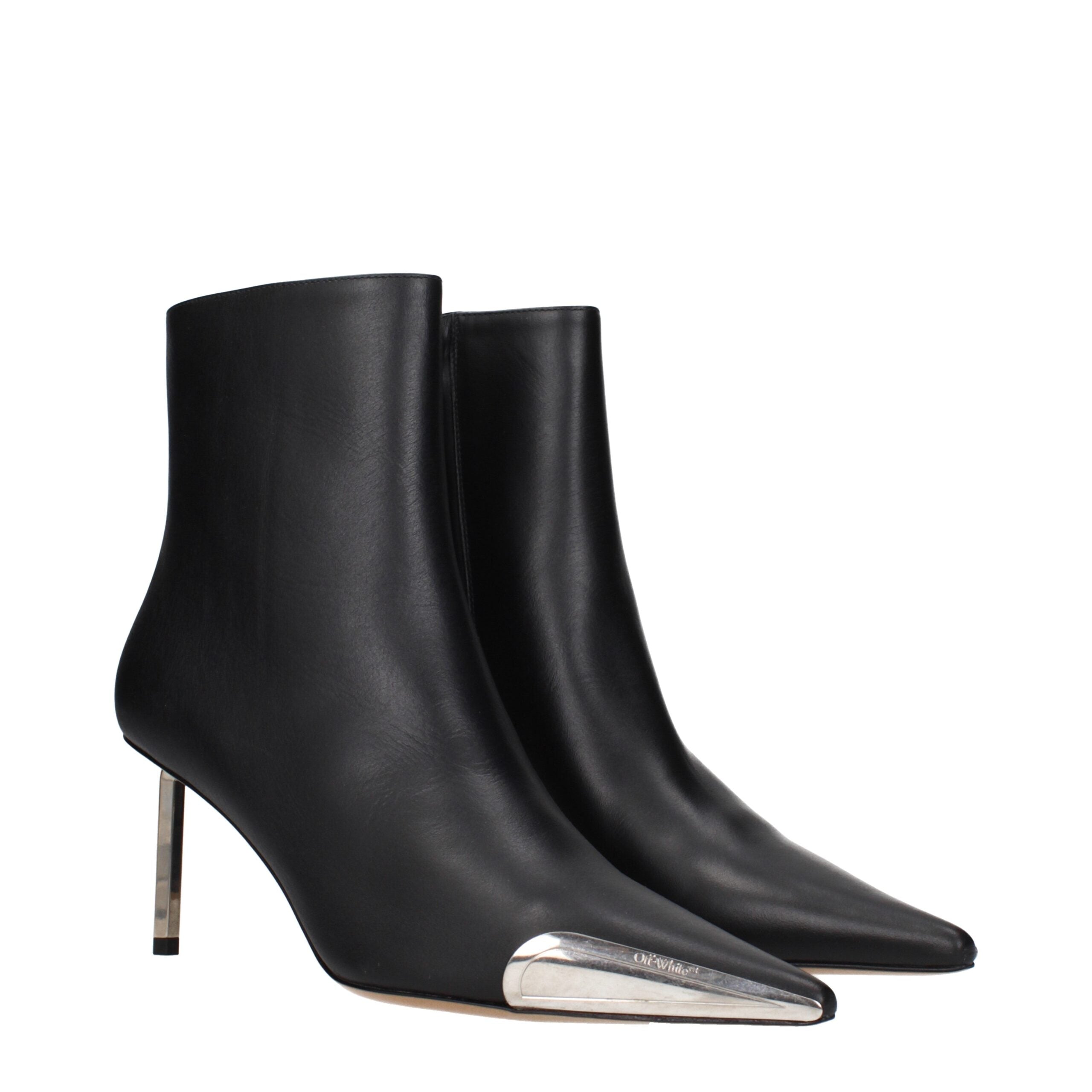 Step into a realm of refined elegance with Off-White Black Leather Ankle Boots, where exquisite craftsmanship meets avant-garde luxury for the discerning individual.